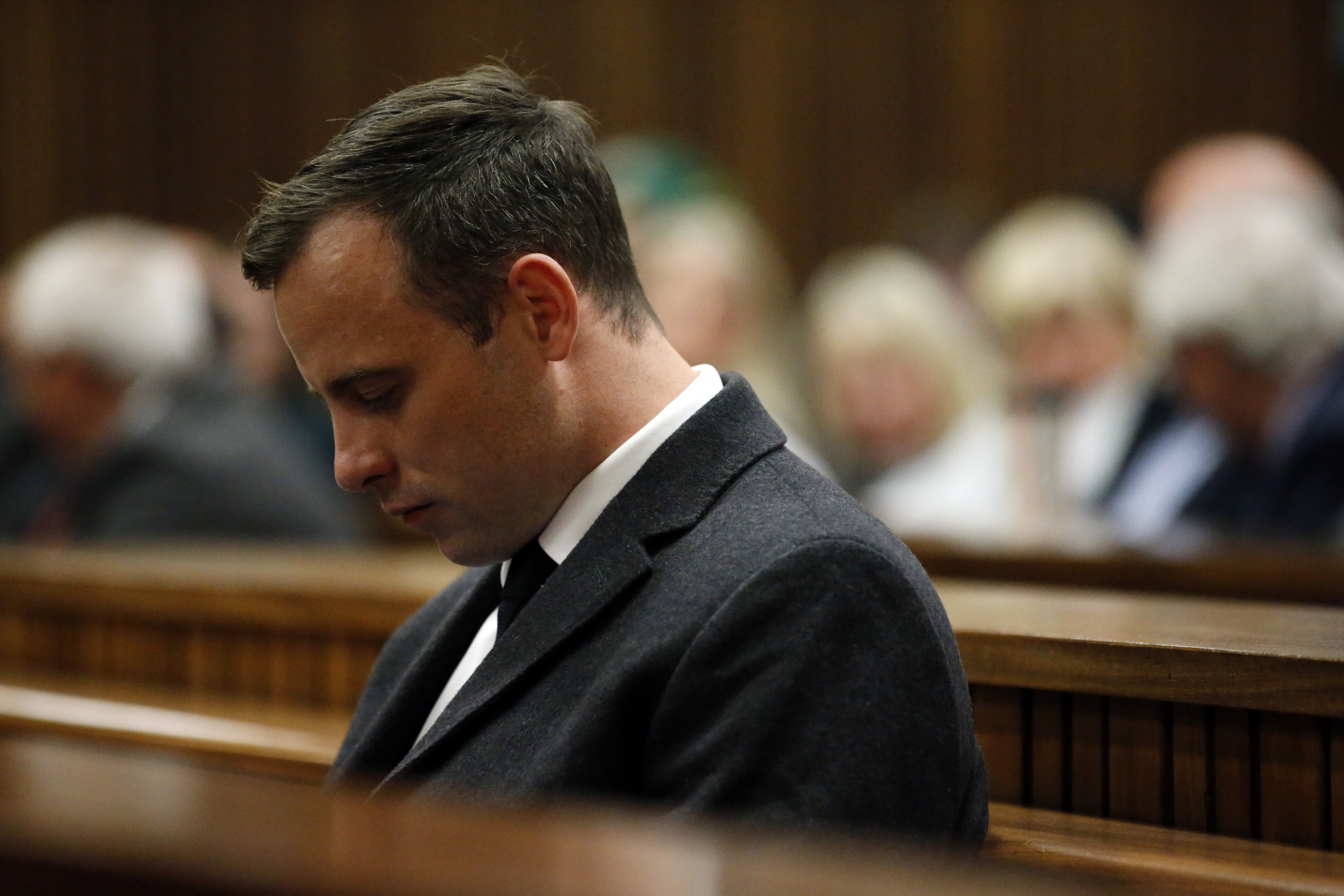 Athlete Oscar Pistorius, accused of the murder of his girlfriend Reeva Steenkamp three years ago, attends a hearing of his murder trial at the High Court in Pretoria, South Africa on July 6, 2016.