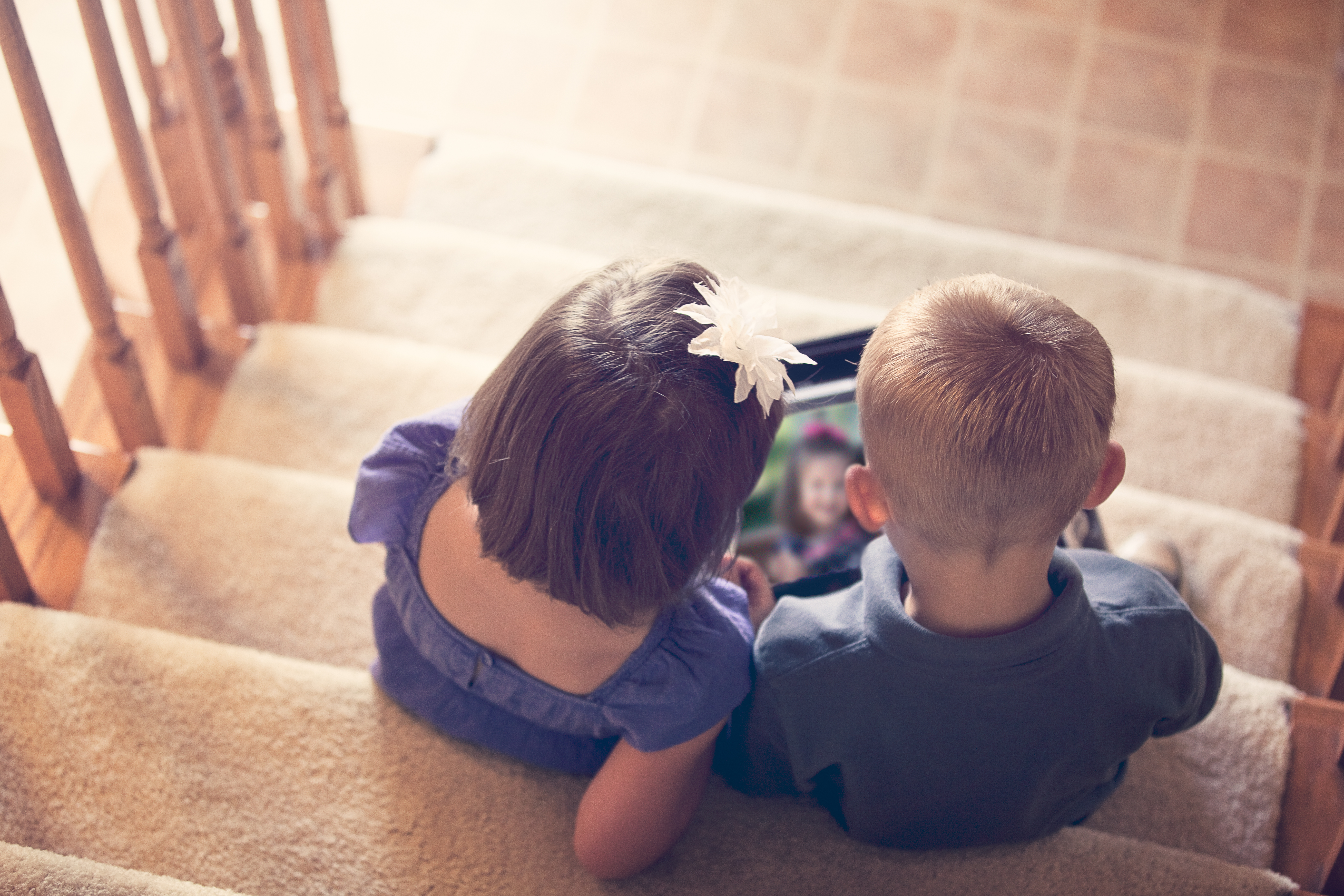 Children looking at photo