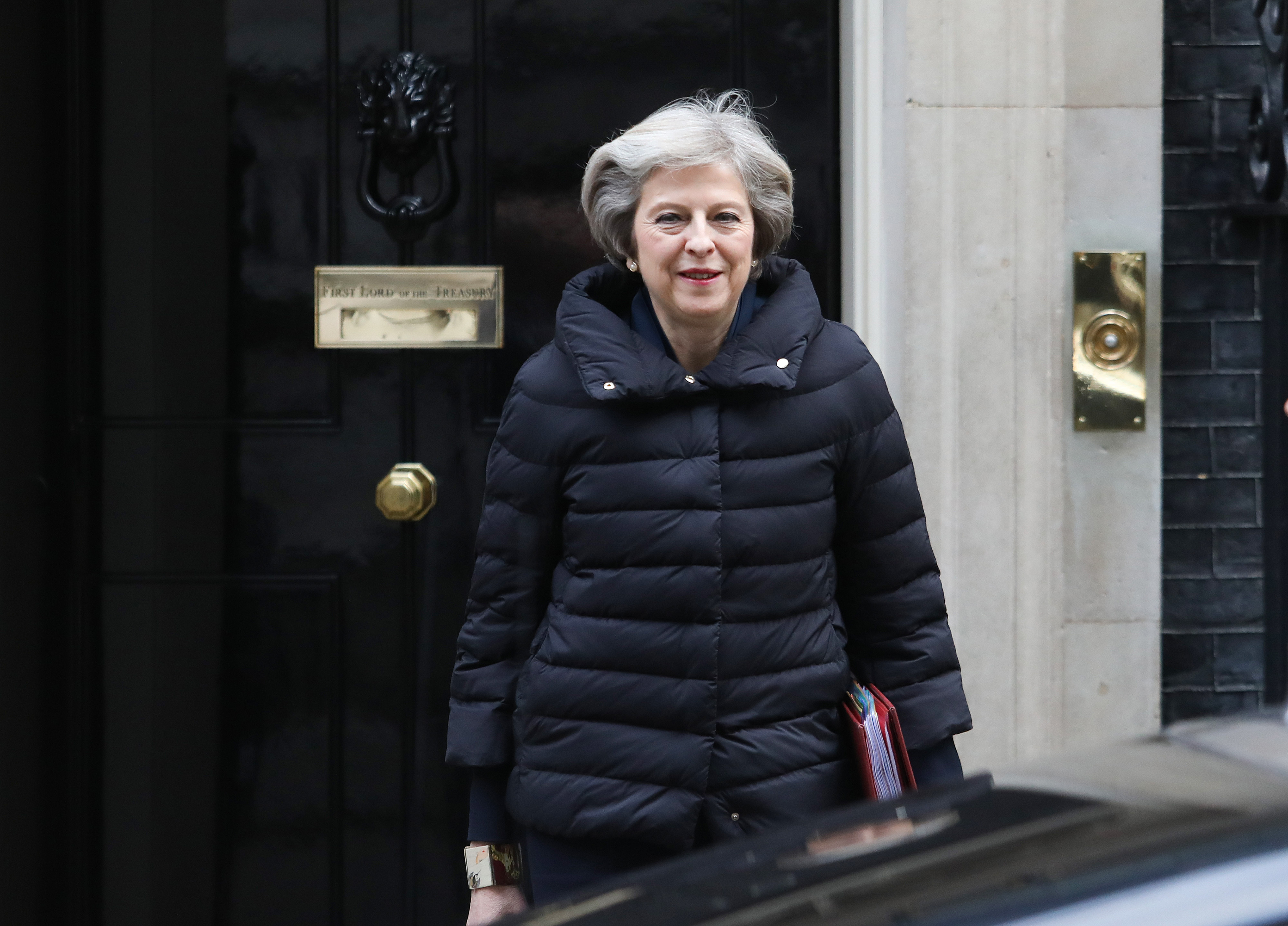 Theresa May, U.K. prime minister, leaves 10 Downing Street, to attend the weekly question-and-answer session in Parliament, in London, U.K., on Wednesday, Jan. 11, 2017.