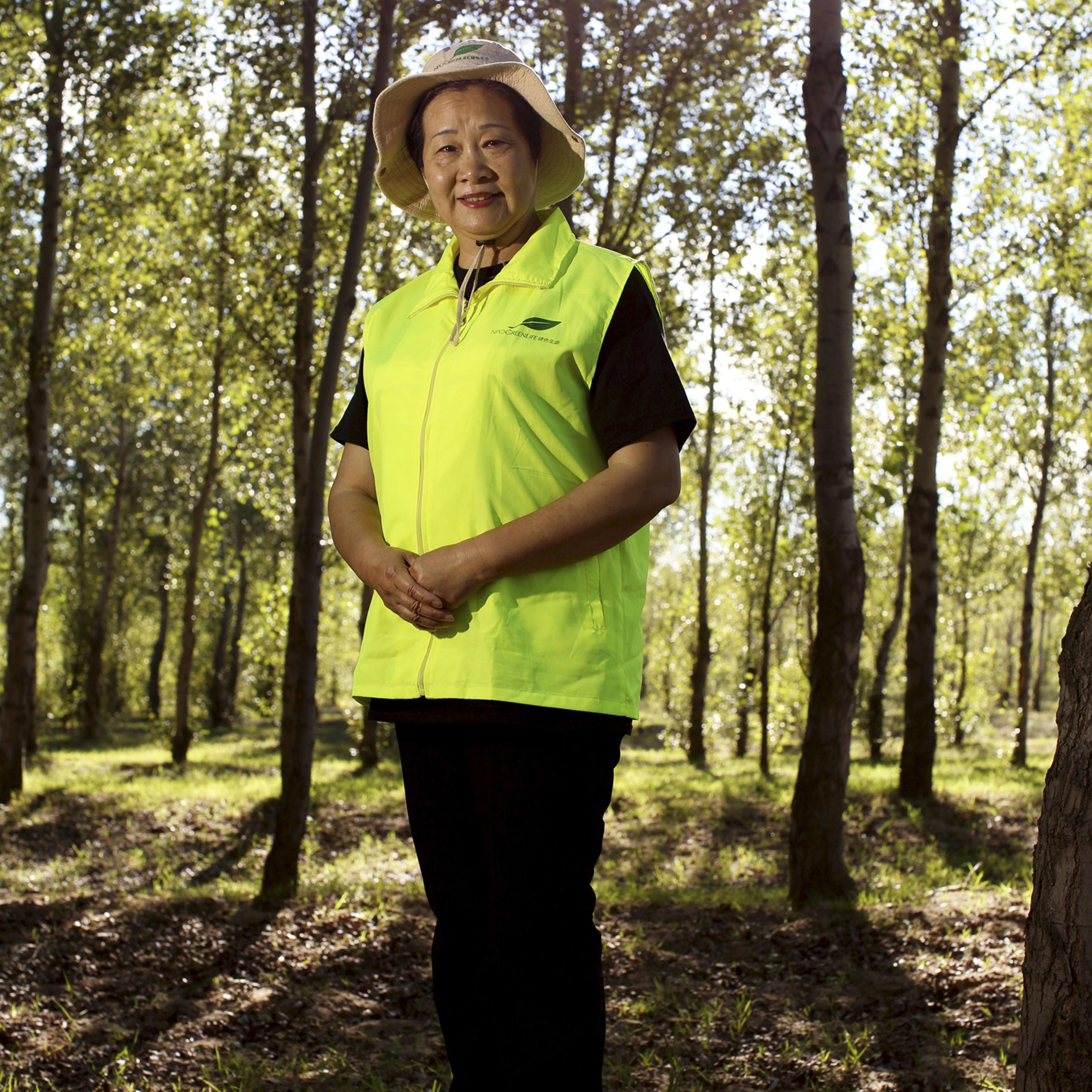 Since 2001, Yi and her Green Life NGO have planted countless numbers of trees
