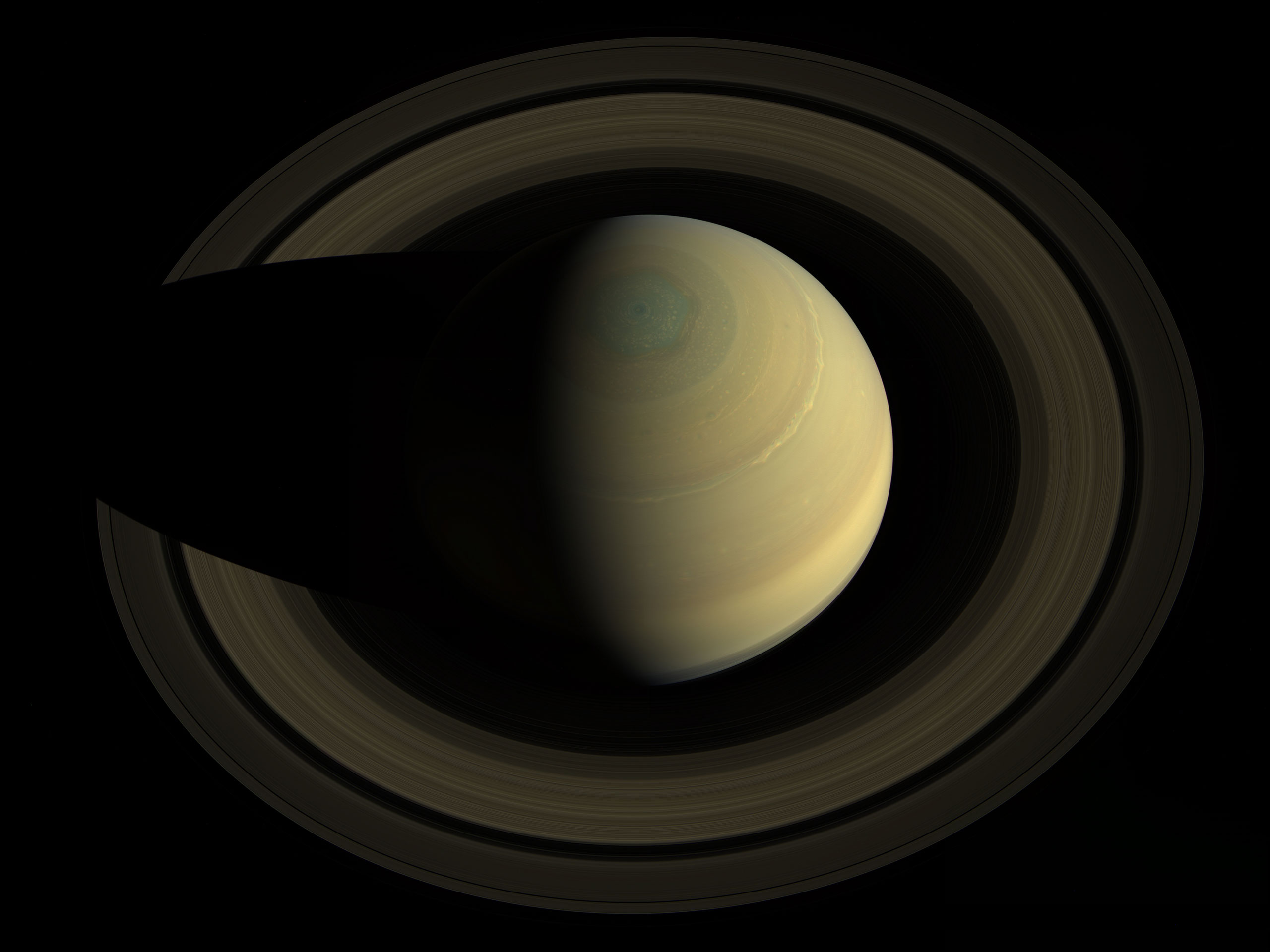 A swing high above Saturn by NASA's Cassini spacecraft revealed this stately view of the golden-hued planet and its main rings on Oct. 10, 2013