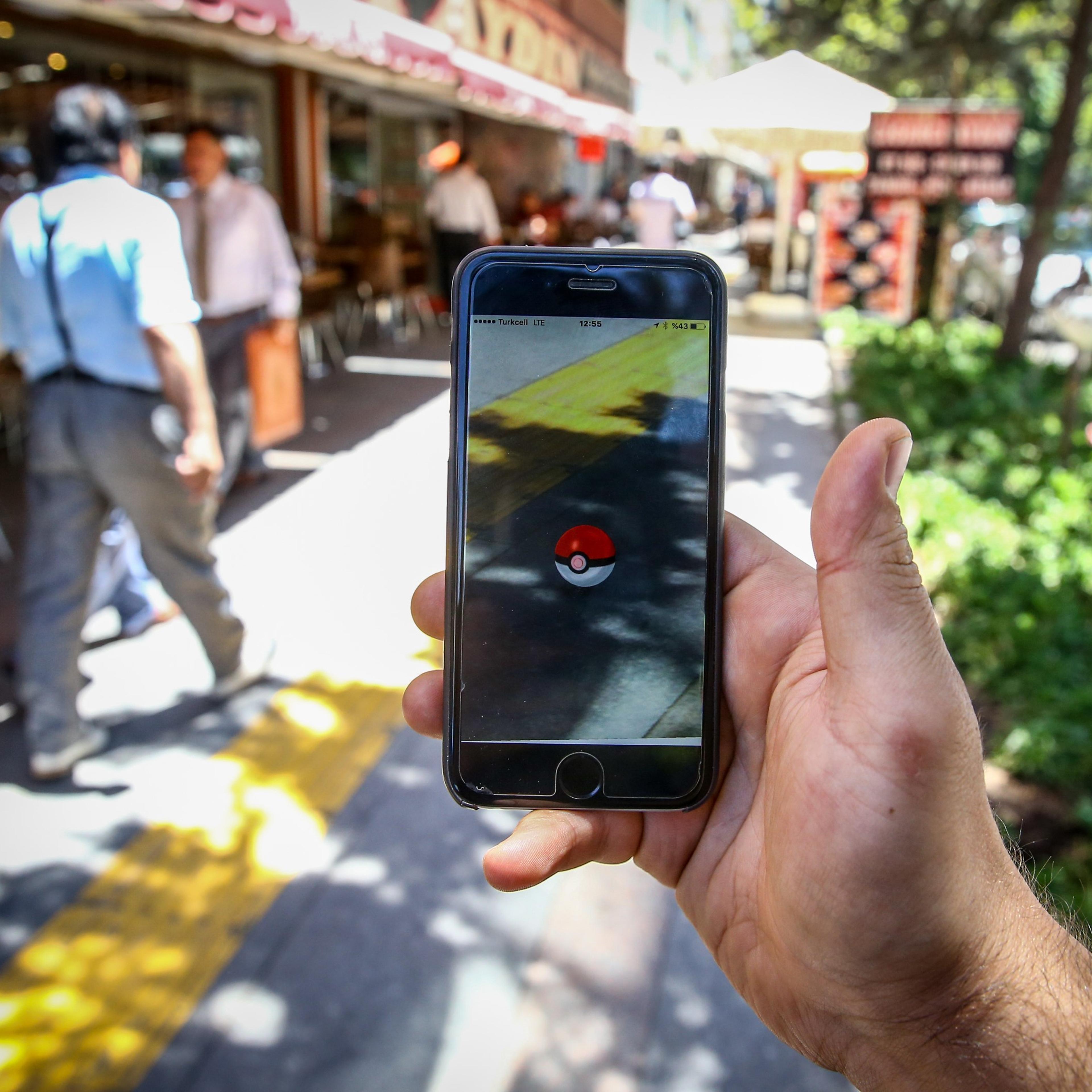 A Pokemon Go user plays Pokemon GO game in Ankara, Turkey on July 13, 2016.