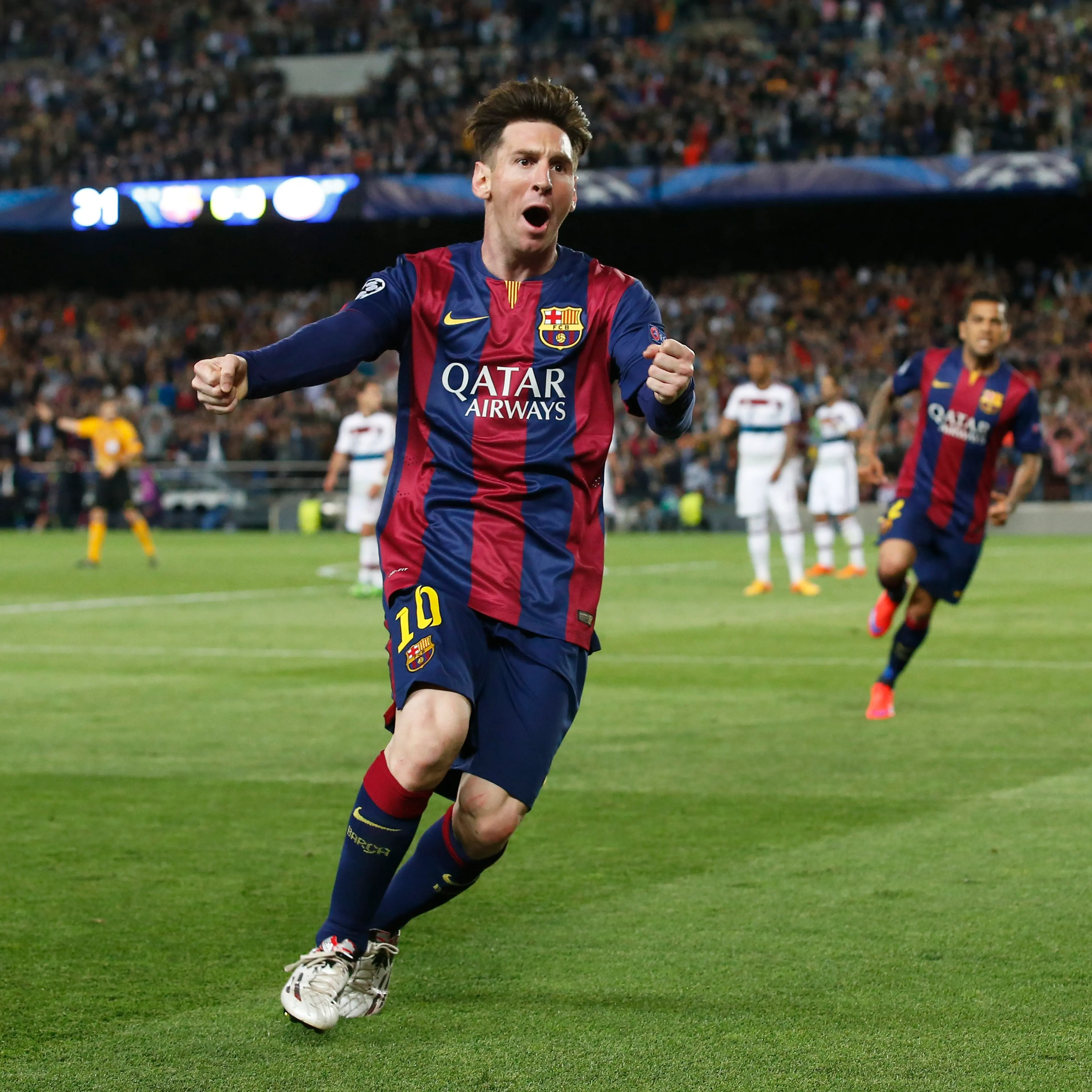 Barcelona's Lionel Messi celebrates his first goal against Bayern Munich in the UEFA Champions League Semi Final First Leg at The Nou Camp in Barcelona on May 5, 2015.