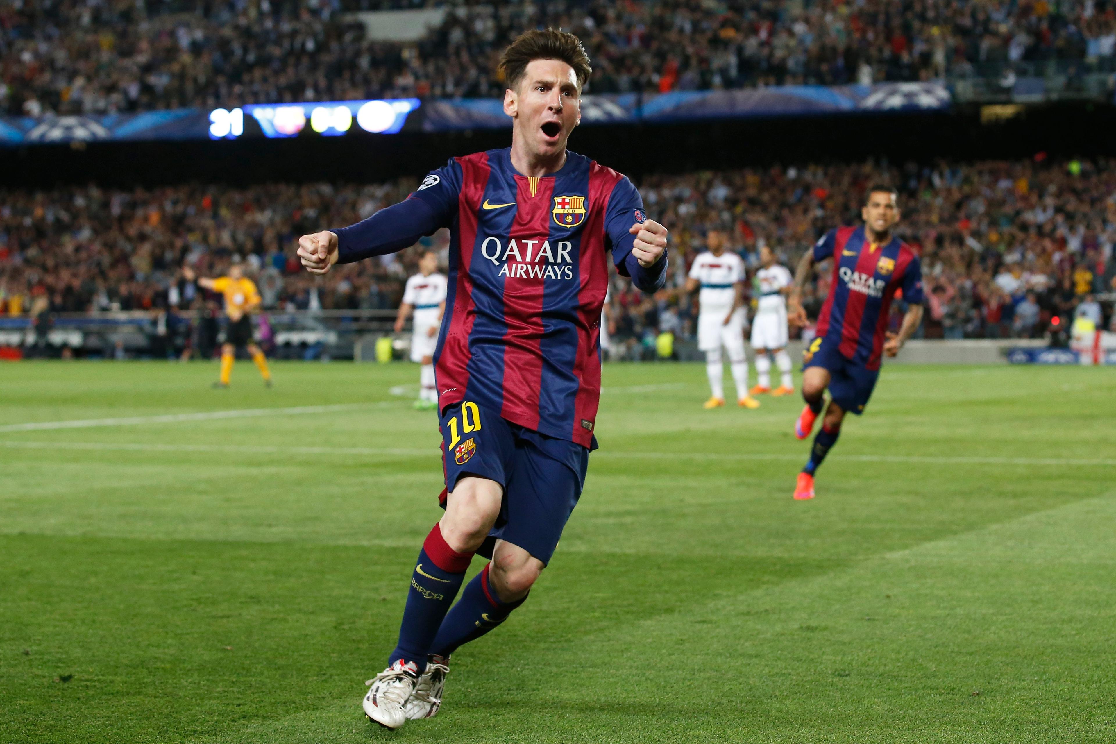 Barcelona's Lionel Messi celebrates his first goal against Bayern Munich in the UEFA Champions League Semi Final First Leg at The Nou Camp in Barcelona on May 5, 2015.