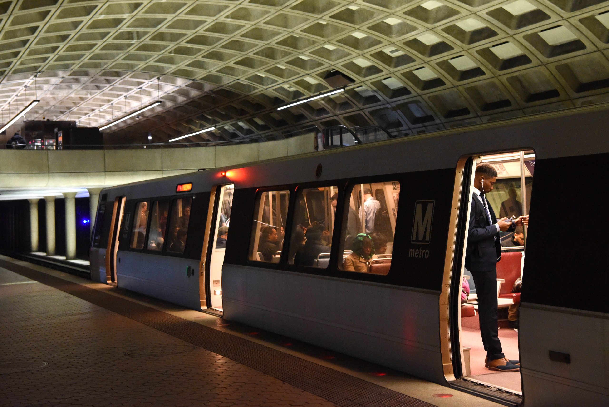 Washington, DC - March 30, 2016: A man waited aboard a Metro train at the Metro Center station on March 30, 2016 in Washington DC. Metro's top officials warned that the transit system is in such need of repair that they might shut down entire rail lines 