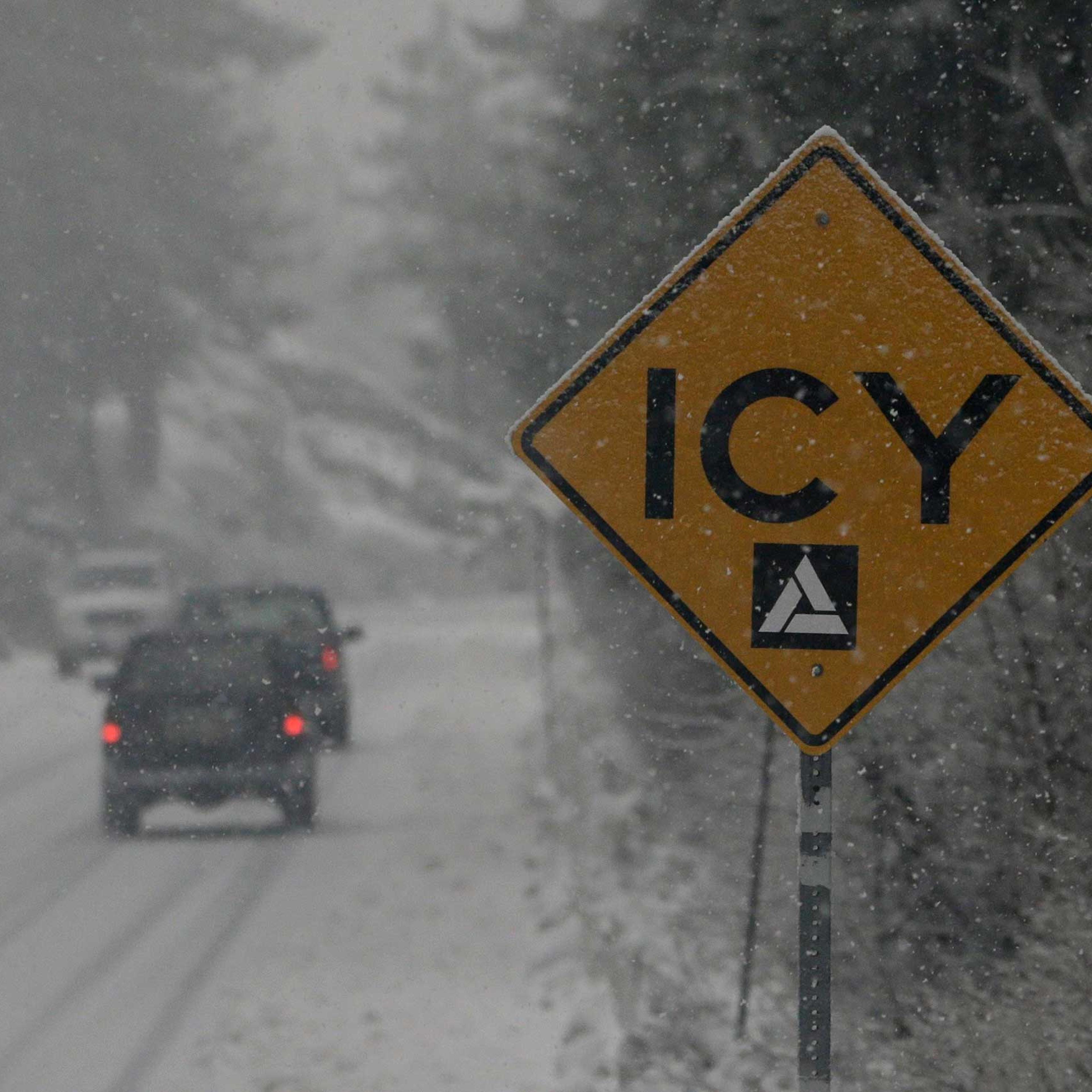 A sign warns drivers of the road conditions on Donner Pass Road near Soda Springs, Calif., Dec. 11, 2014.