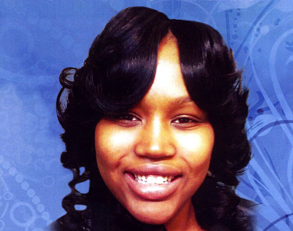 This undated file photo is the cover of a funeral program showing 19-year-old Renisha McBride from a service in Detroit.