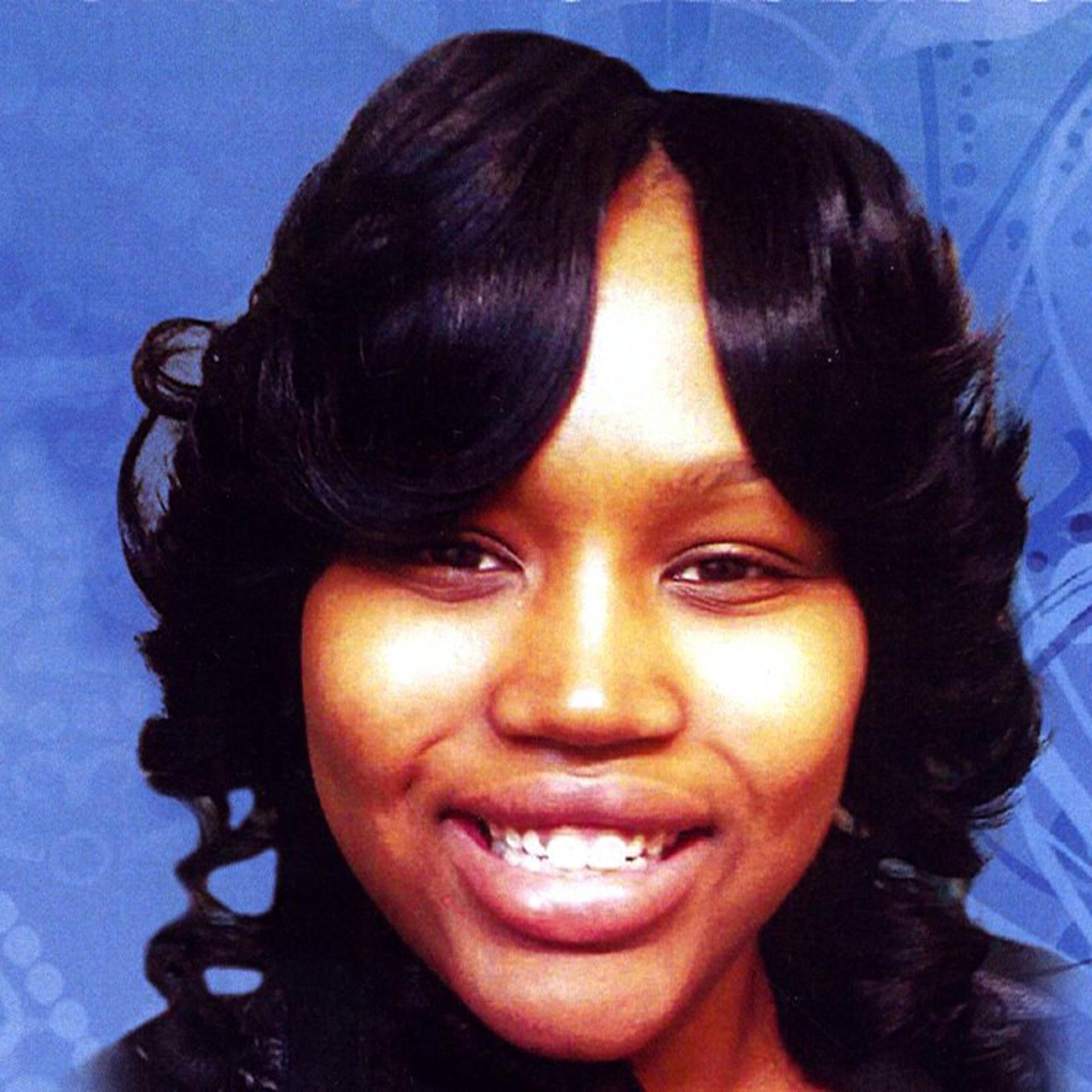 This undated file photo is the cover of a funeral program showing 19-year-old Renisha McBride from a service in Detroit.