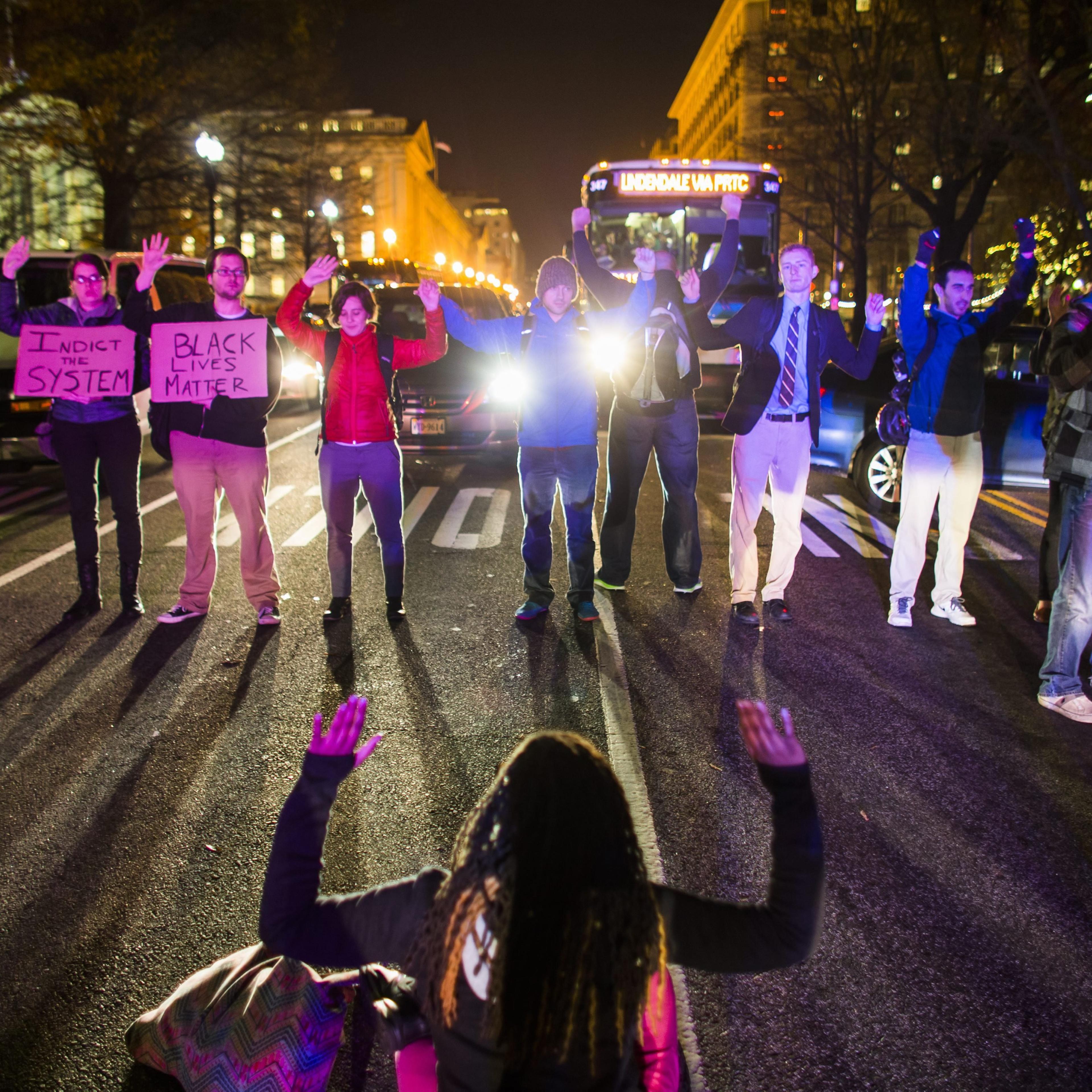 Protestors block 15th Street near Pennsylvania Avenue to protest the Staten Island grand jury's decision not to indict officer Daniel Pantaleo in the Eric Garner chokehold case in Washington on Dec. 3, 2014.