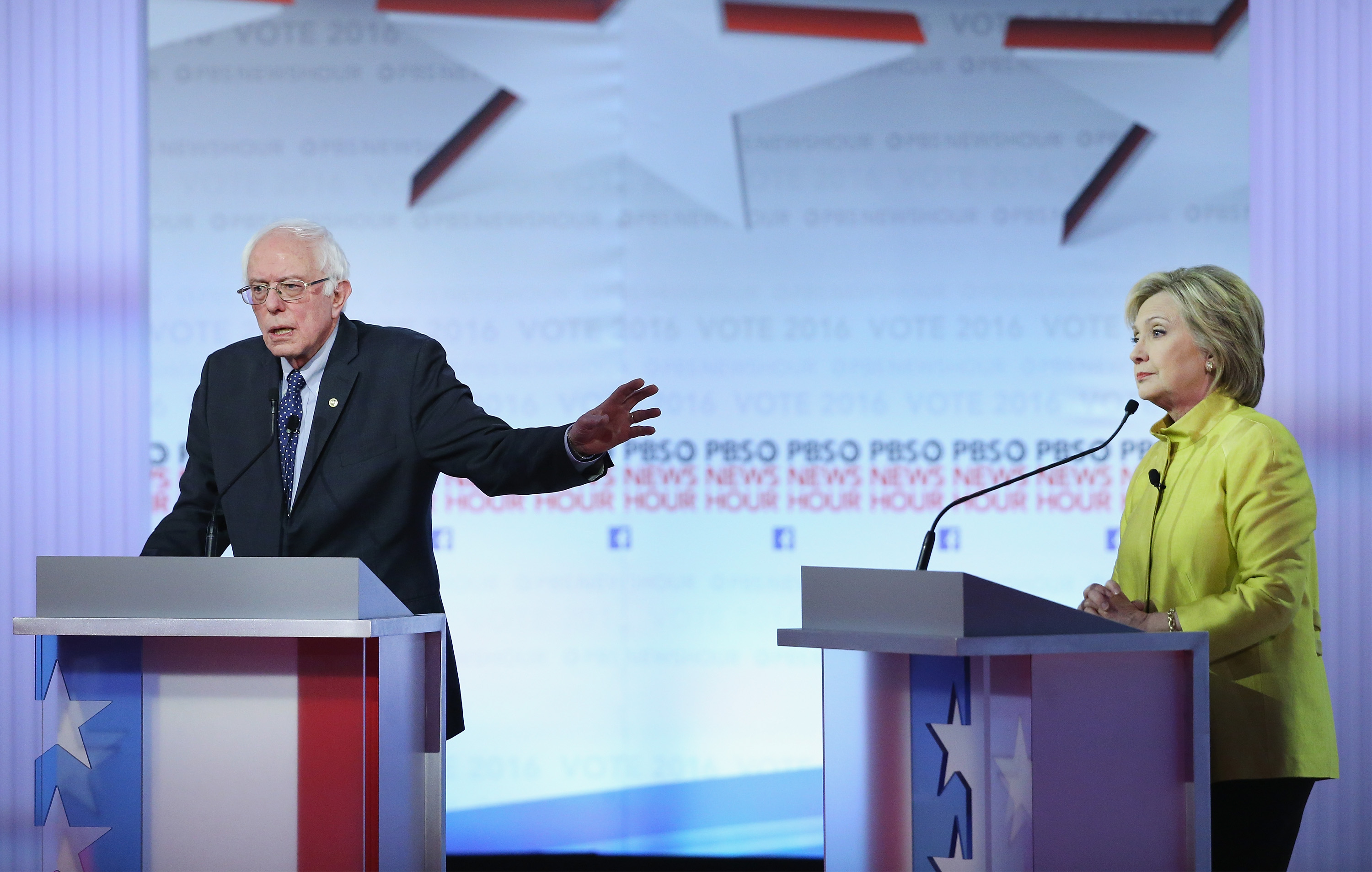 Bernie Sanders (L) and Hillary Clinton participate in the PBS NewsHour Democratic presidential candidate debate at the University of Wisconsin-Milwaukee on Feb. 11 in Milwaukee, Wisconsin.