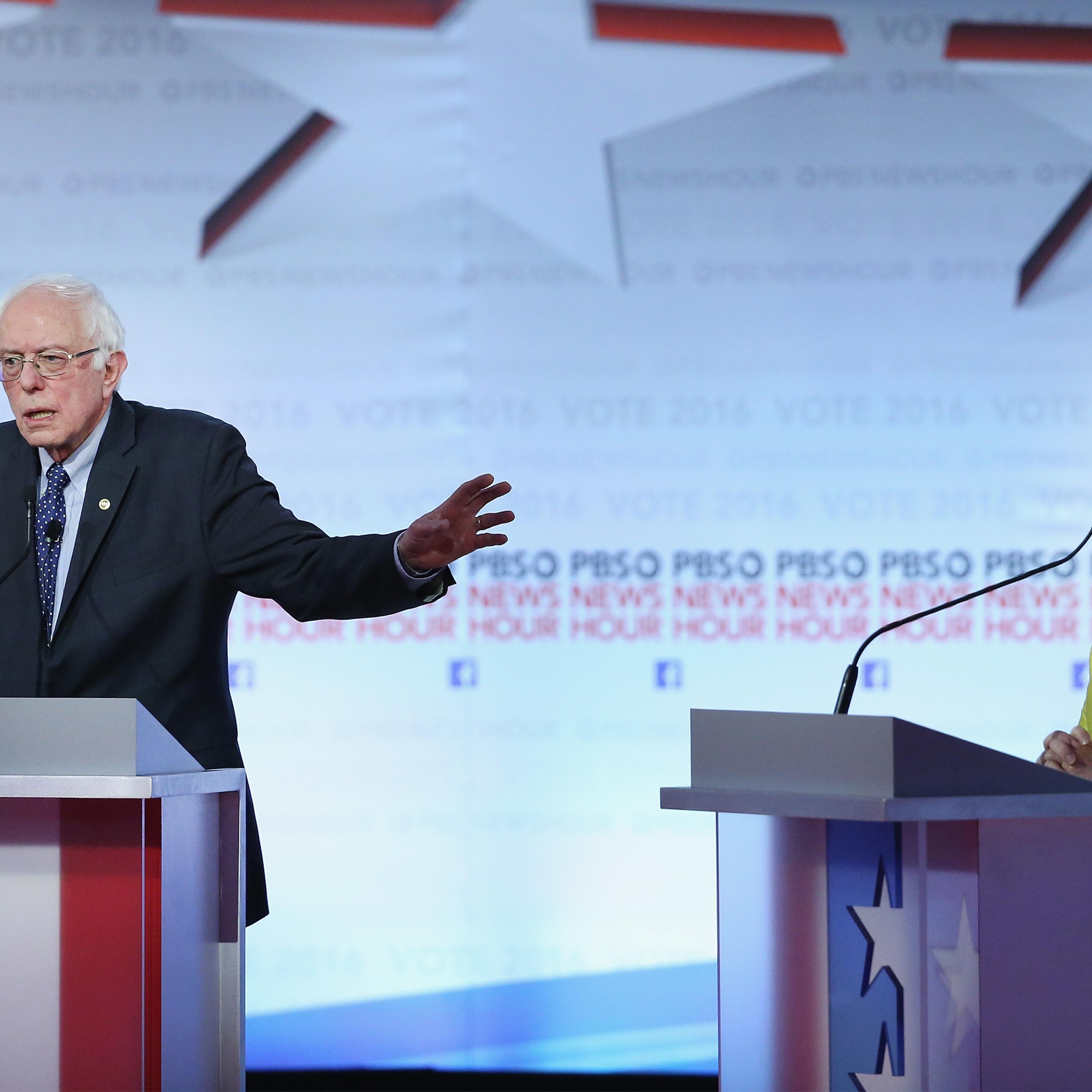 Bernie Sanders (L) and Hillary Clinton participate in the PBS NewsHour Democratic presidential candidate debate at the University of Wisconsin-Milwaukee on Feb. 11 in Milwaukee, Wisconsin.
