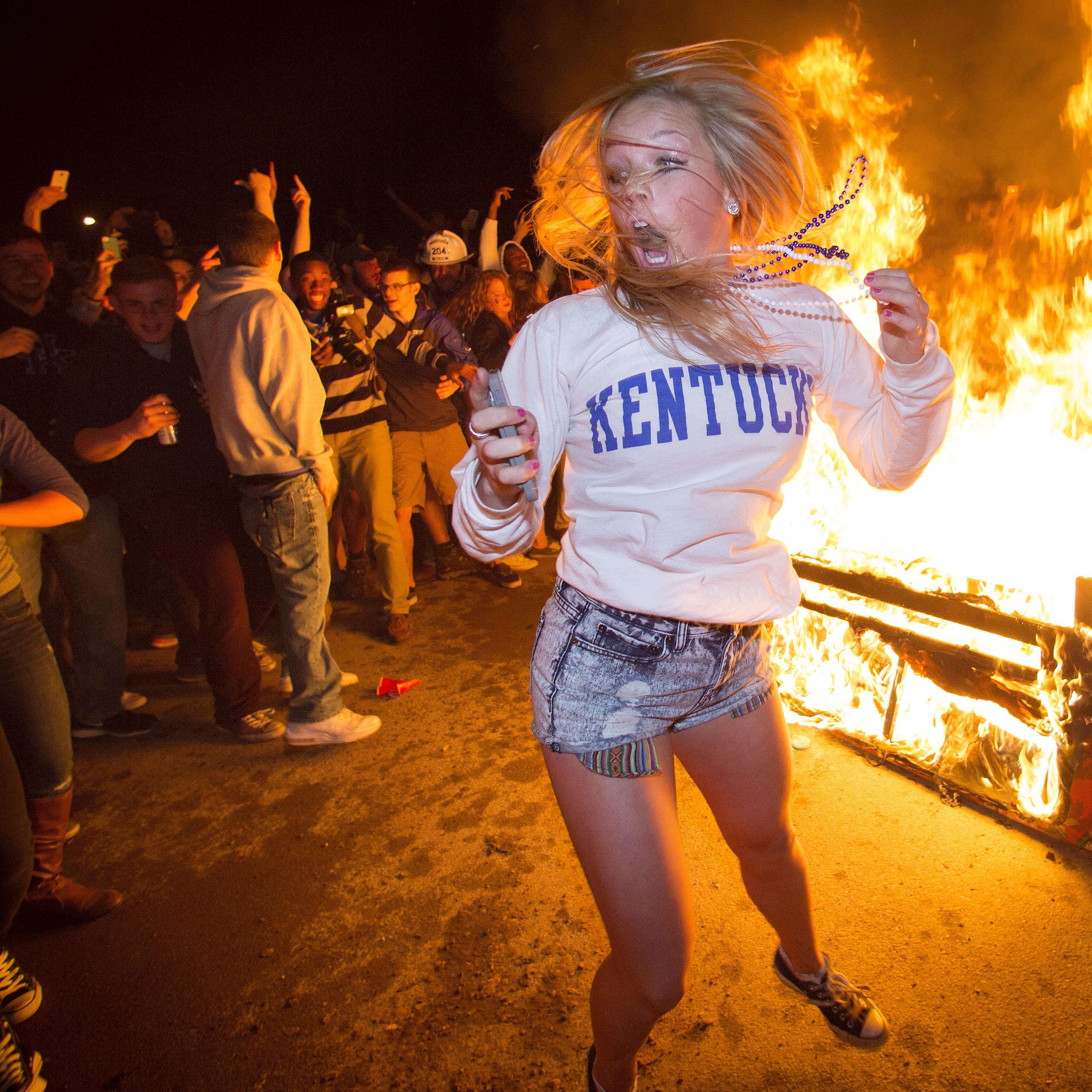 University of Kentucky fans celebrate on State Street after their team's come from behind victory over the University of Louisville to advance to the Elite 8 in the NCAA Men's Basketball Tournament on March 28, 2014.