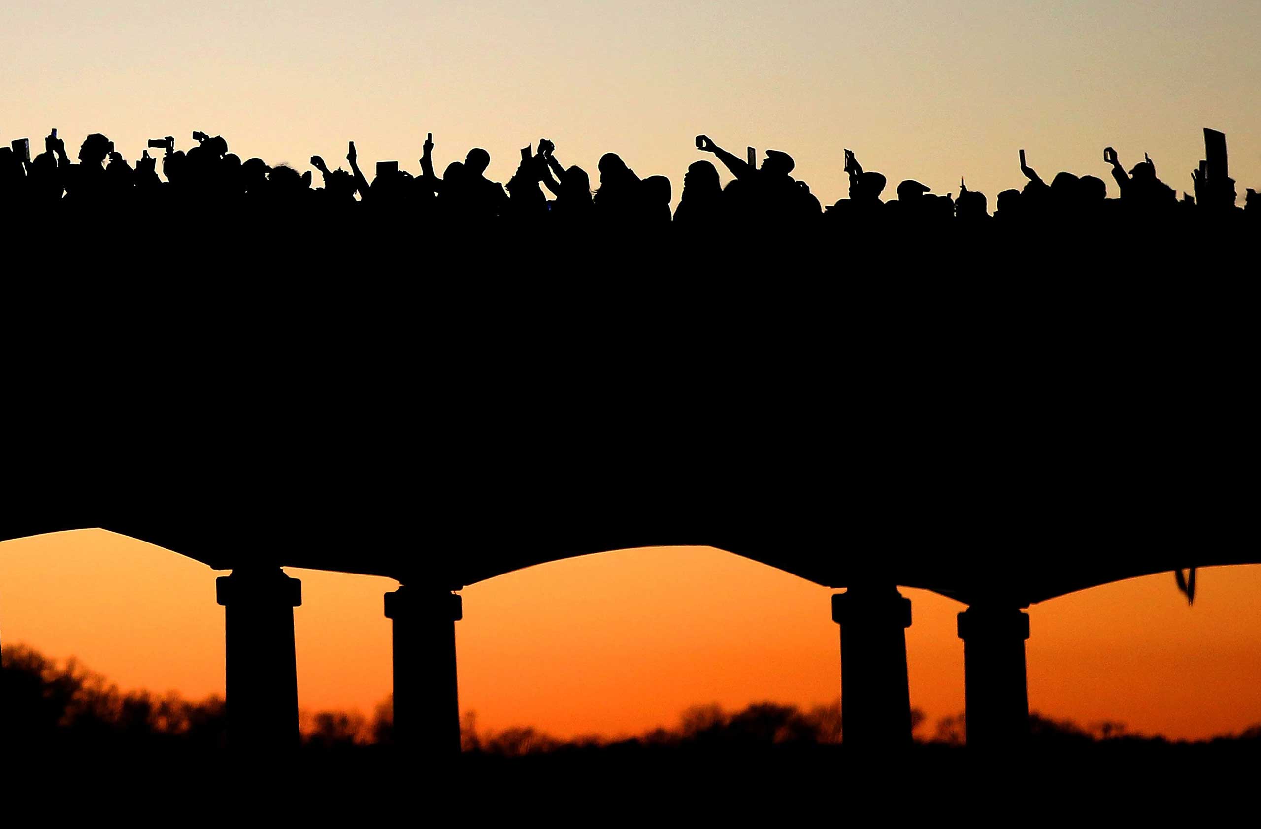 Thousands march across the Edmund Pettus Bridge
