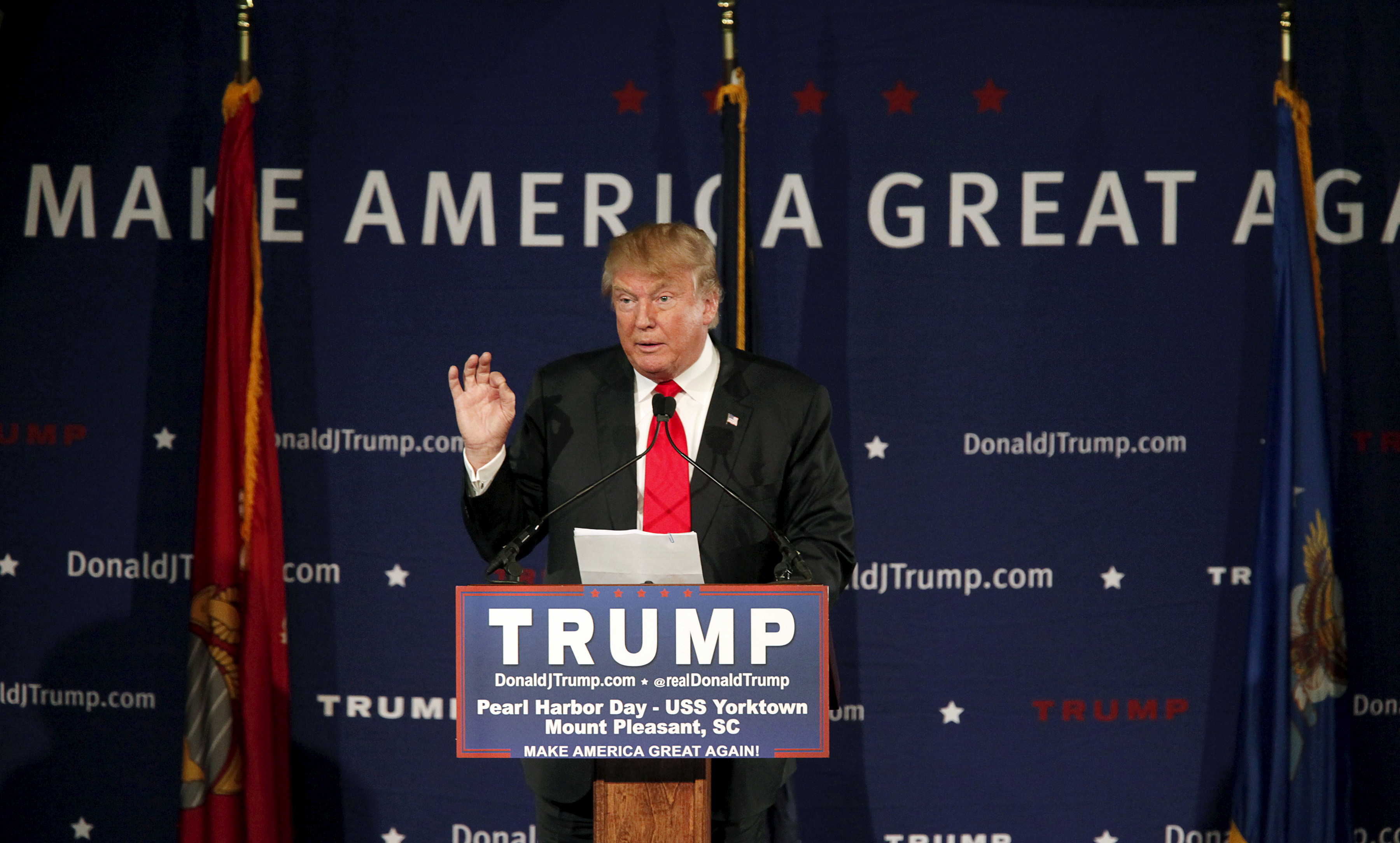 U.S. Republican presidential candidate Donald Trump speaks to supporters at a Pearl Harbor Day rally aboard the USS Yorktown Memorial in Mount Pleasant