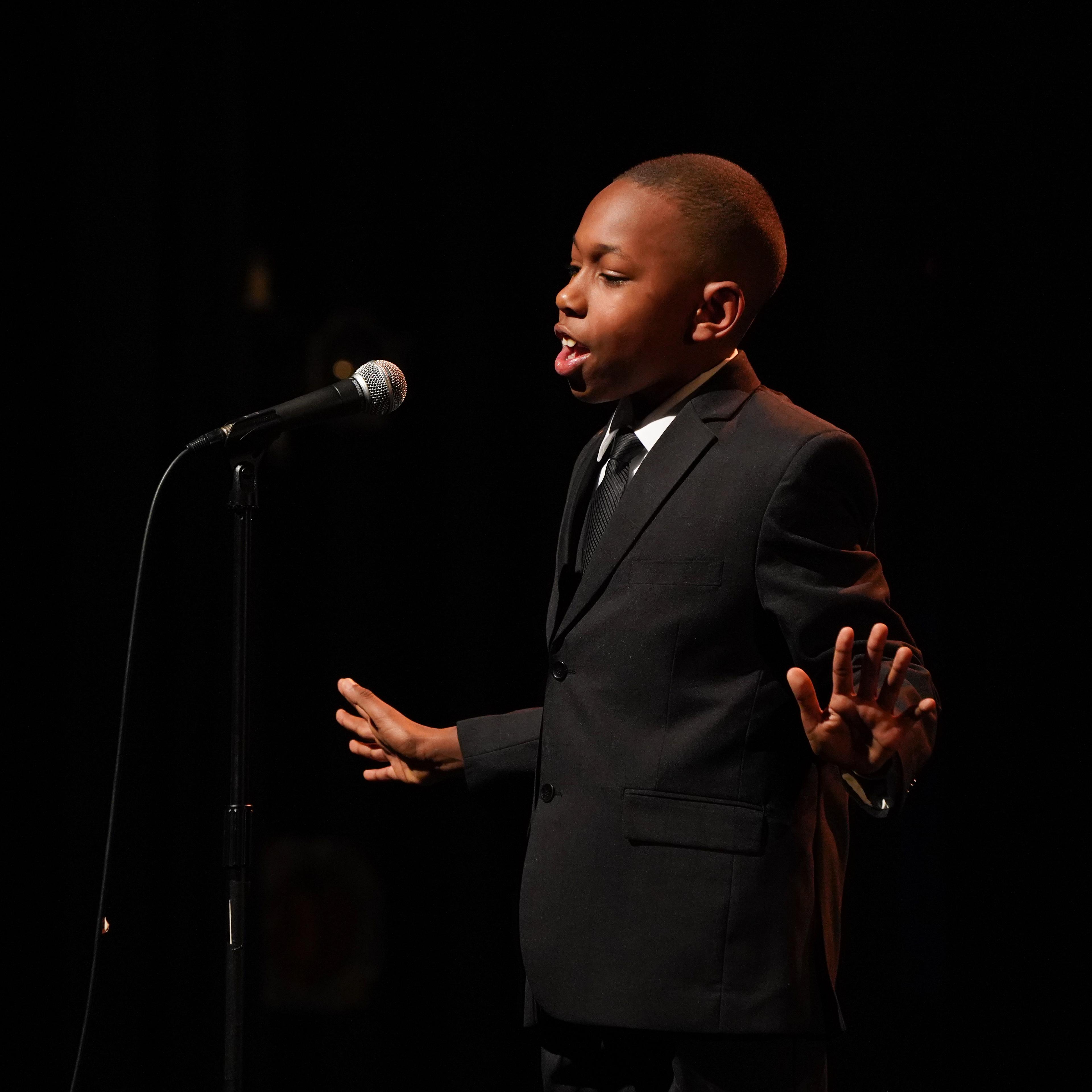 Gregory Payton, 9, delivers a tribute to the Martin Luther King, Jr. speech known as "I've Been to the Mountaintop" (1968) at the 2019 Dr. Martin Luther King, Jr. Oratorical Festival in Oakland, Calif.