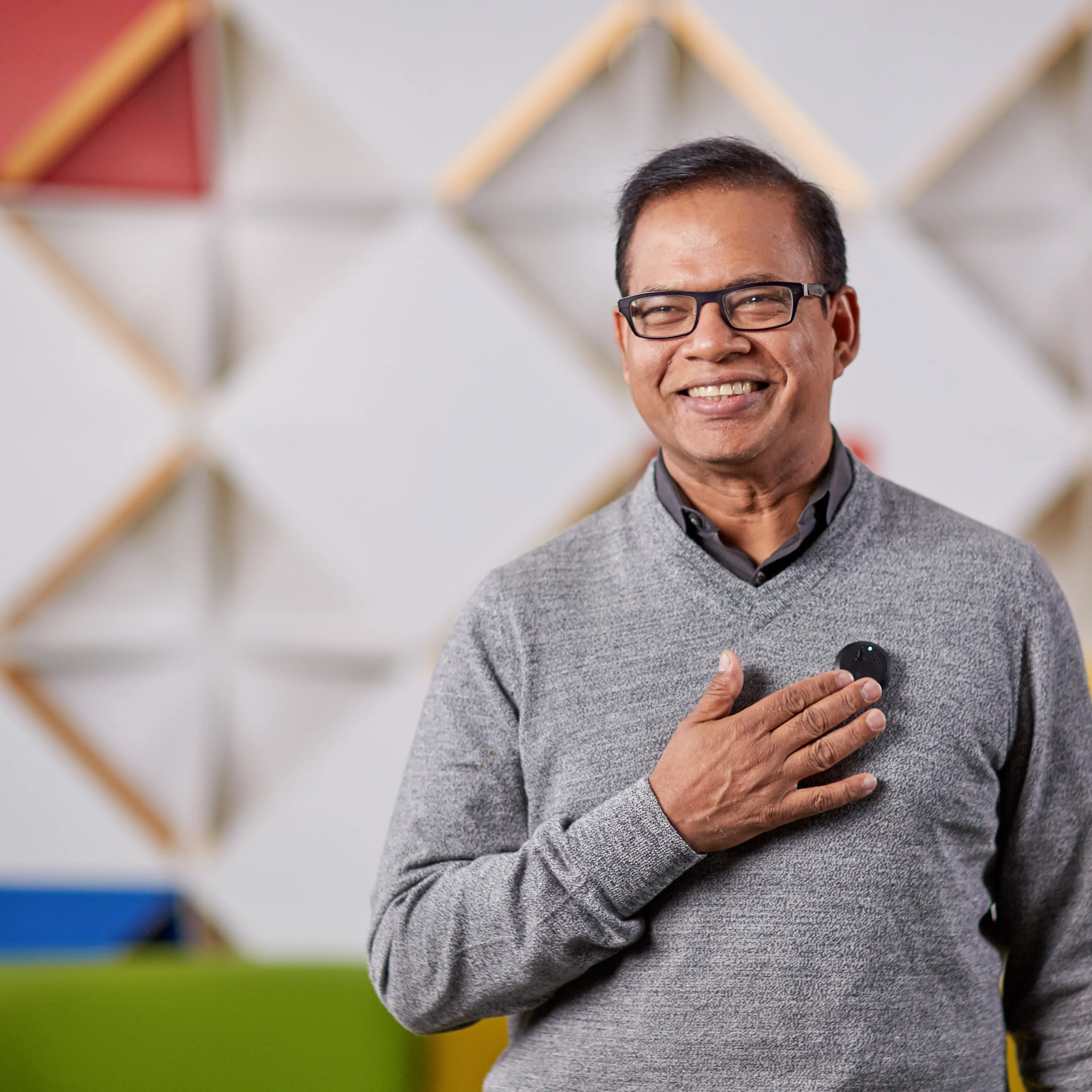 Amit Singhal, senior vice president and software engineer at Google, uses a prototype lapel pin modeled after the communicator badge from Star Trek. The device, which never left the testing phase, uses a microphone to listen to a user's voice and can use Bluetooth to send those commands to another device.