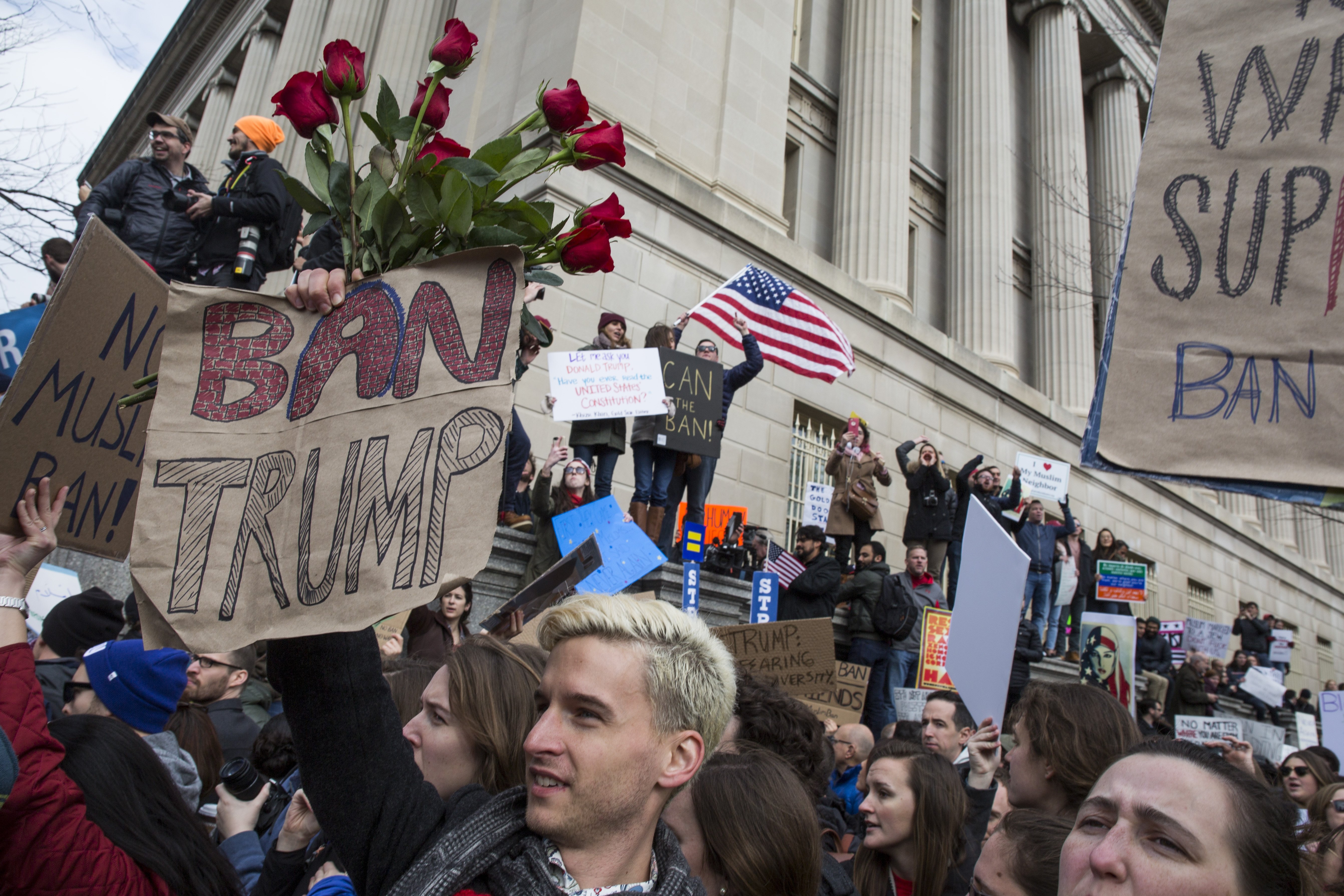 Demonstrators gather near the White House to protest President Donald Trump's travel ban on seven Muslim countries, in Washington, on Jan. 29, 2017.
