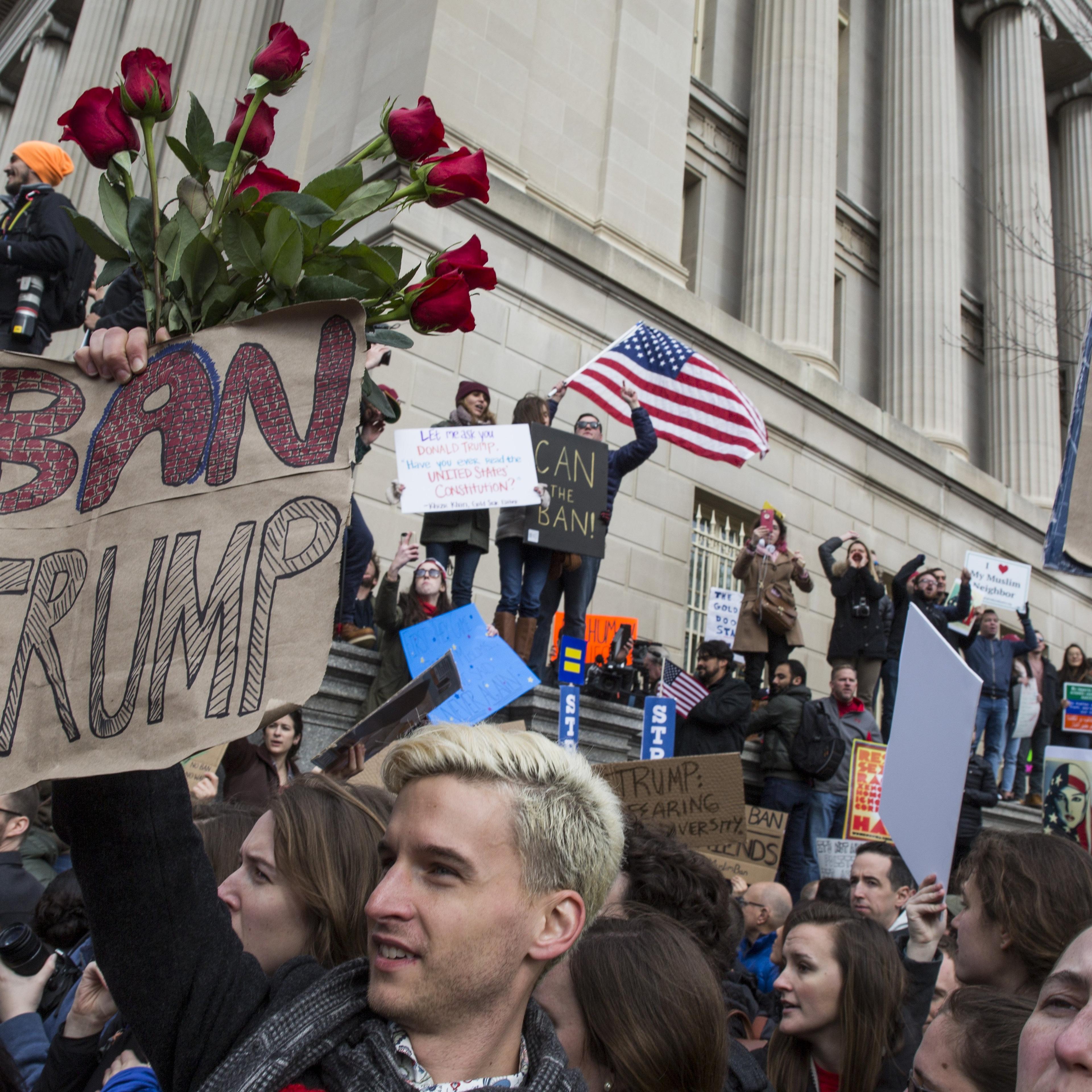 Demonstrators gather near the White House to protest President Donald Trump's travel ban on seven Muslim countries, in Washington, on Jan. 29, 2017.