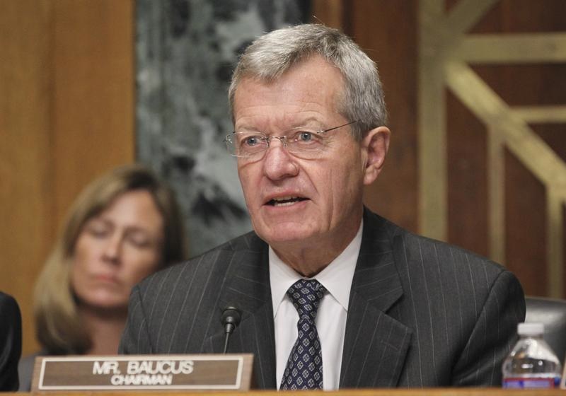 U.S. Senator Baucus questions HHS Secretary Sebelius during Senate Finance Committee hearing about "Obamacare" on Capitol Hill in Washington