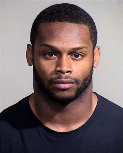 Jonathan Dwyer's booking photo following his arrest for domestic abuse at the Maricopa County Sheriffs Office on Sept. 17, 2014.