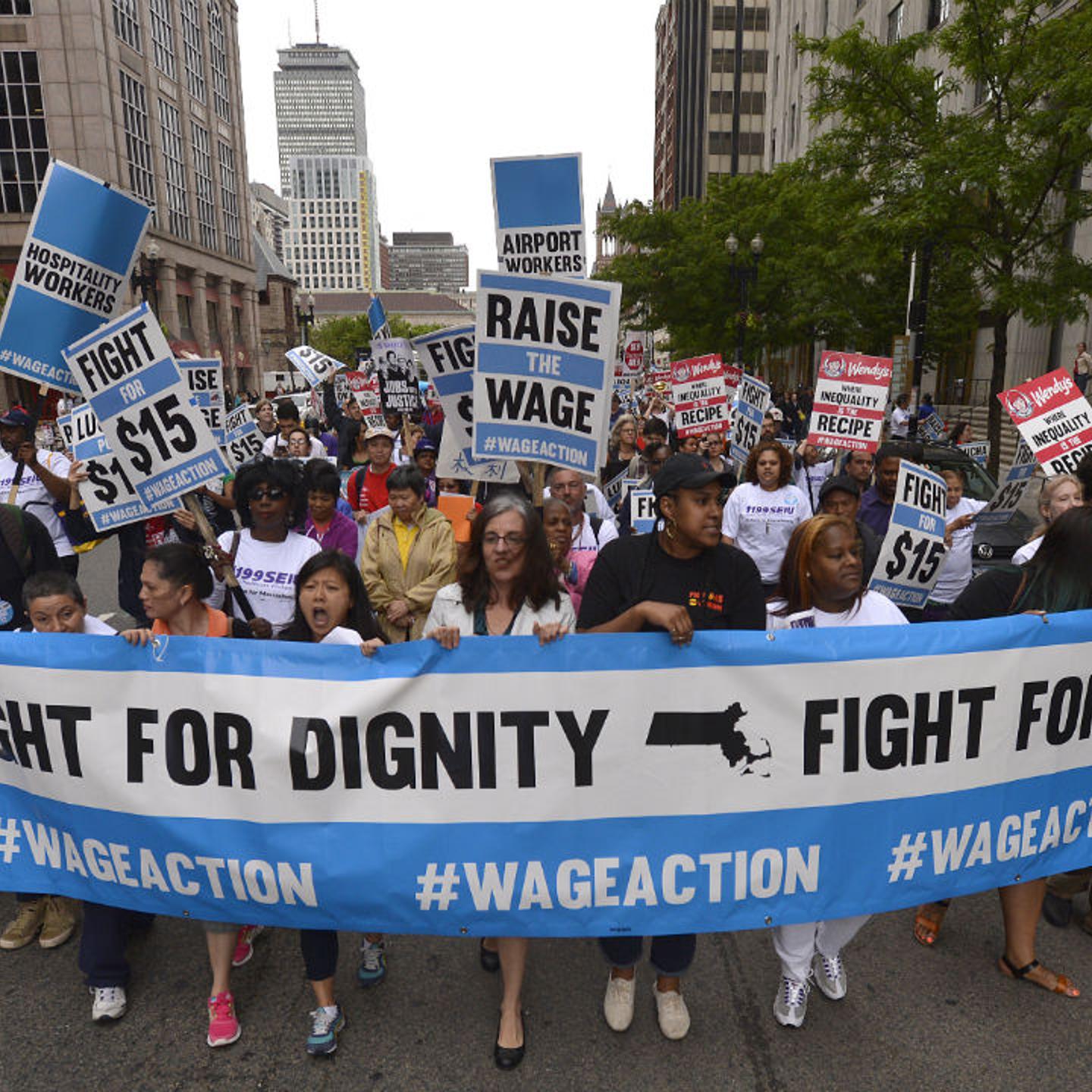 Fed up with an ever-widening income gap and inspired by recent national strike actions, hundreds of low-wage workers from multiple industries gathered in Boston, Worcester, and Springfield on June 12, 2014 to demonstrate for higher wages and to protest growing wage inequality. Shown are workers marching on Boylston St from Copley Square toward Legal Sea Food in Park Square.