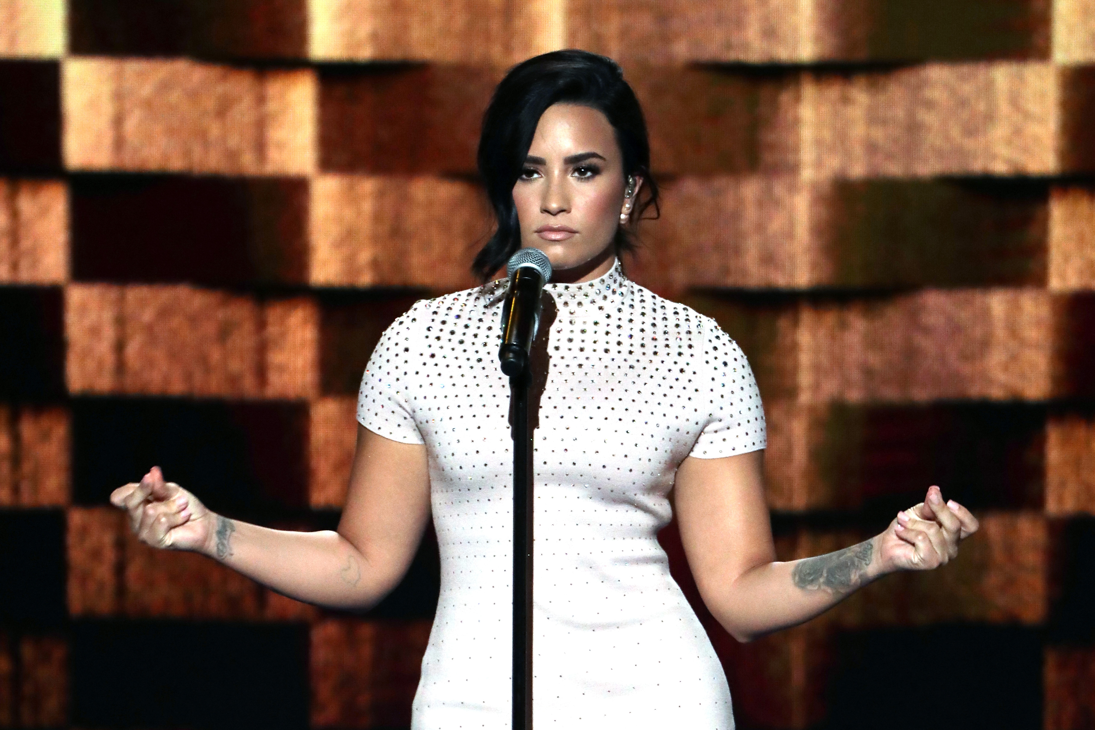 Singer Demi Lovato performs on stage during the first day of the Democratic National Convention at the Wells Fargo Center in Philadelphia on July 25, 2016.