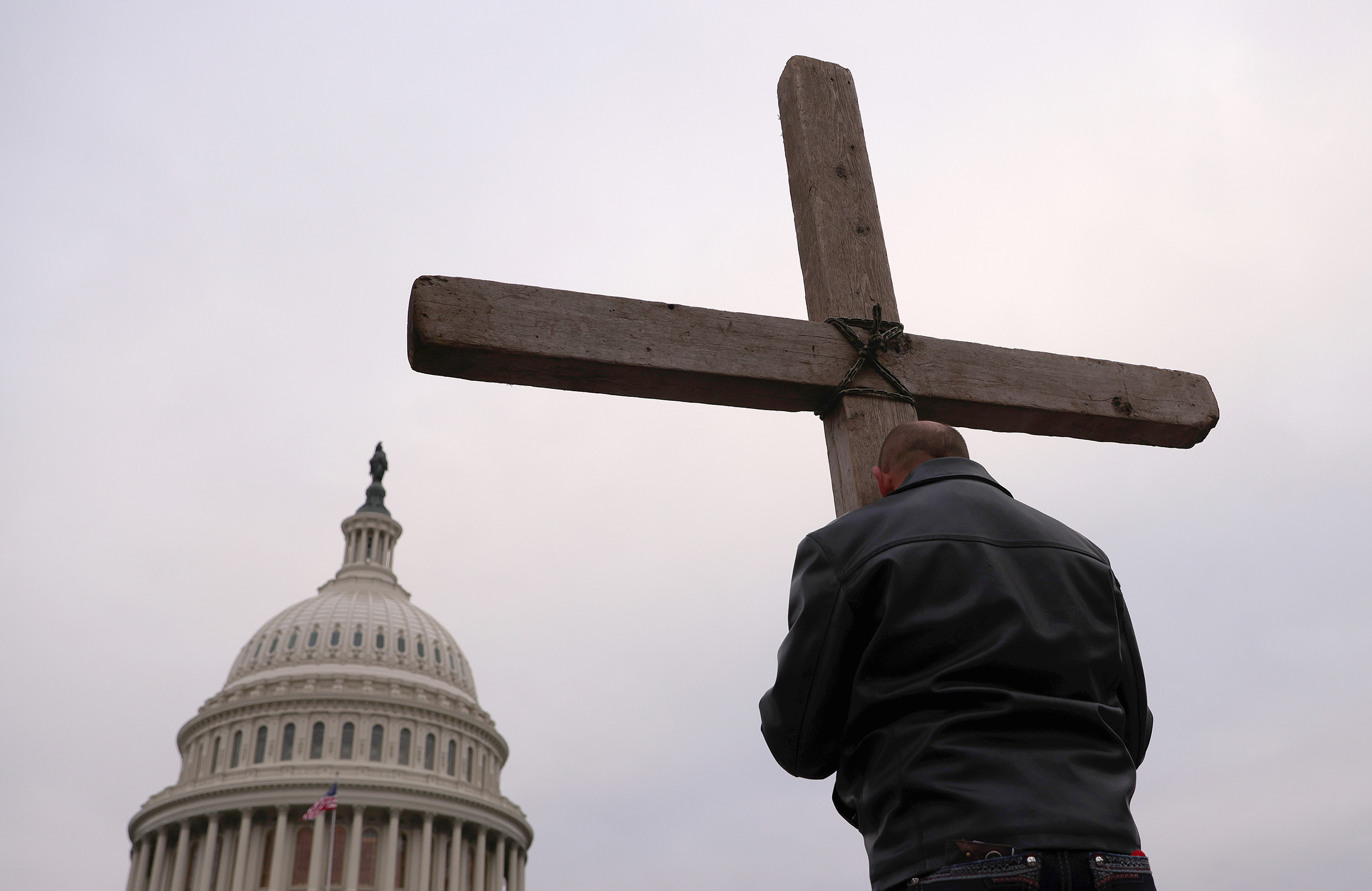 Supporters of U.S. President Donald Trump pray outside the U.S. Capitol Jan. 06 in Washington D.C.