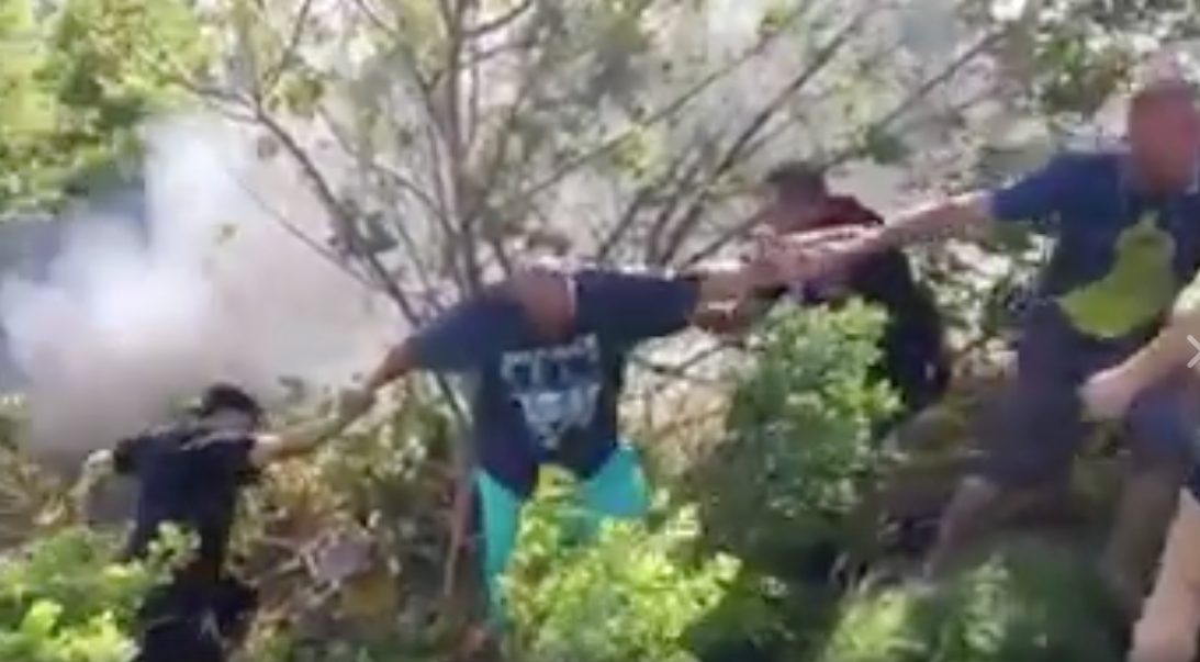 Good Samaritans Form Human Chain to Rescue Man from Burning Car