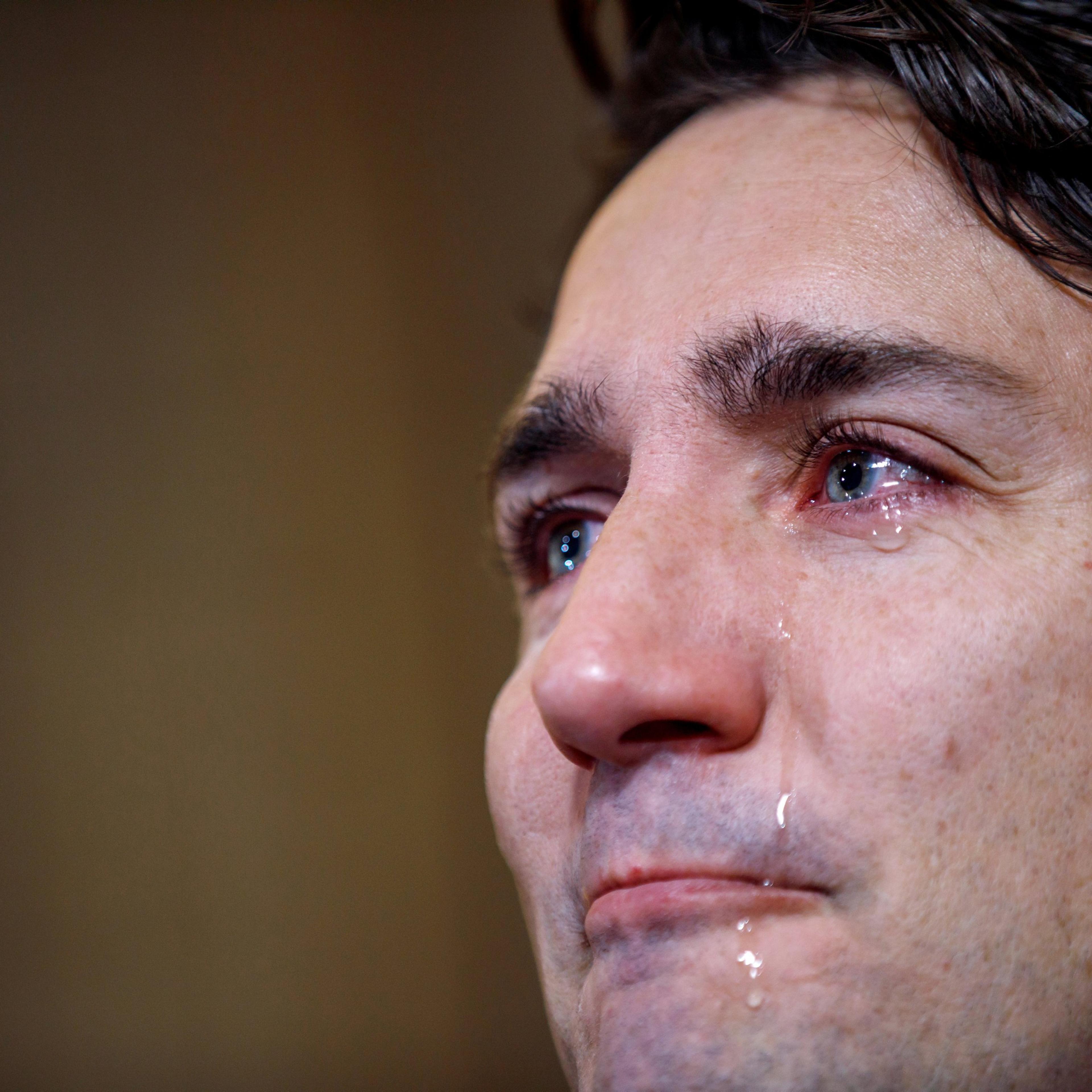 Trudeau sheds tears as he speaks with media about the death of Tragically Hip singer Gord Downie in Ottawa