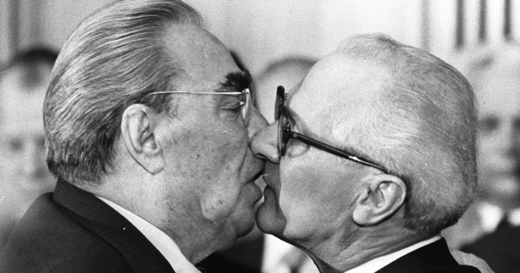 Former Soviet President Leonid Brezhnev and East German leader Erich Honecker exchange a kiss after Brezhnev was honored with the title "Hero of the German Democratic Republik" and the "Karl Marx Medal" in 1979.