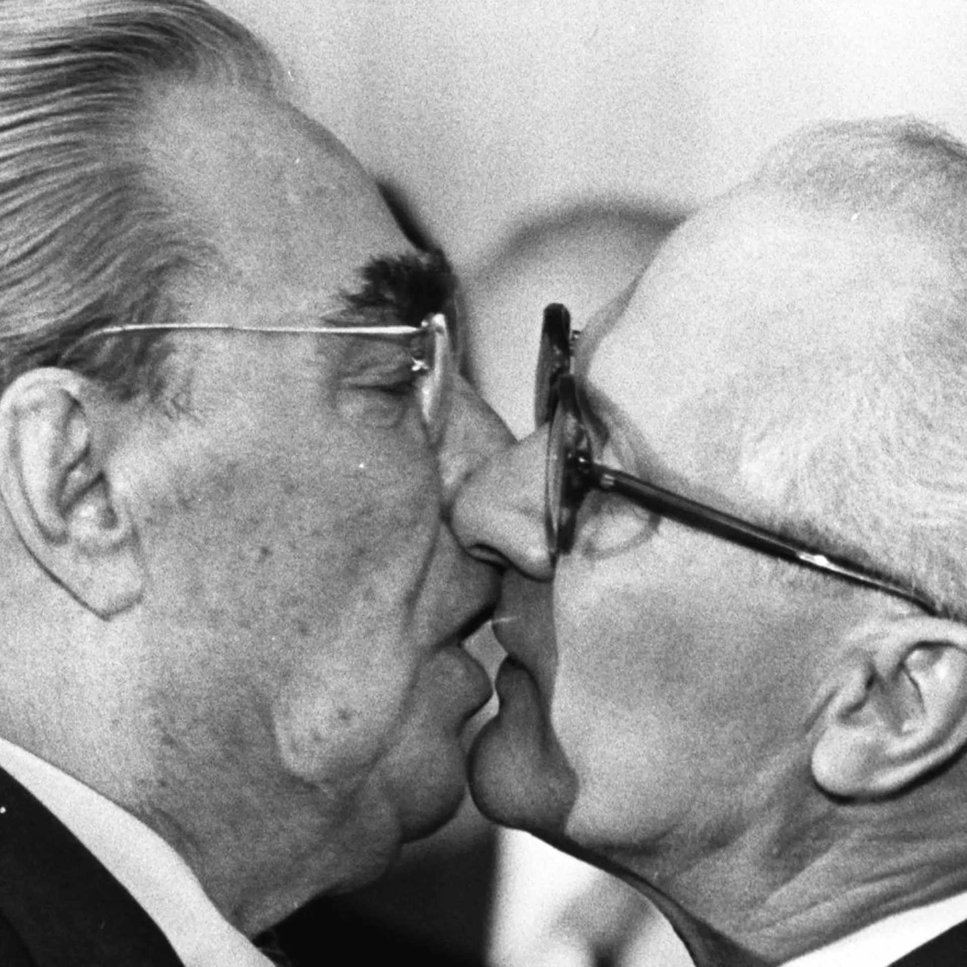 Former Soviet President Leonid Brezhnev and East German leader Erich Honecker exchange a kiss after Brezhnev was honored with the title "Hero of the German Democratic Republik" and the "Karl Marx Medal" in 1979.