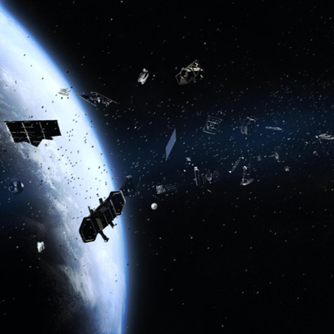 An artist's illustration of low-Earth orbit space junk surrounding the planet