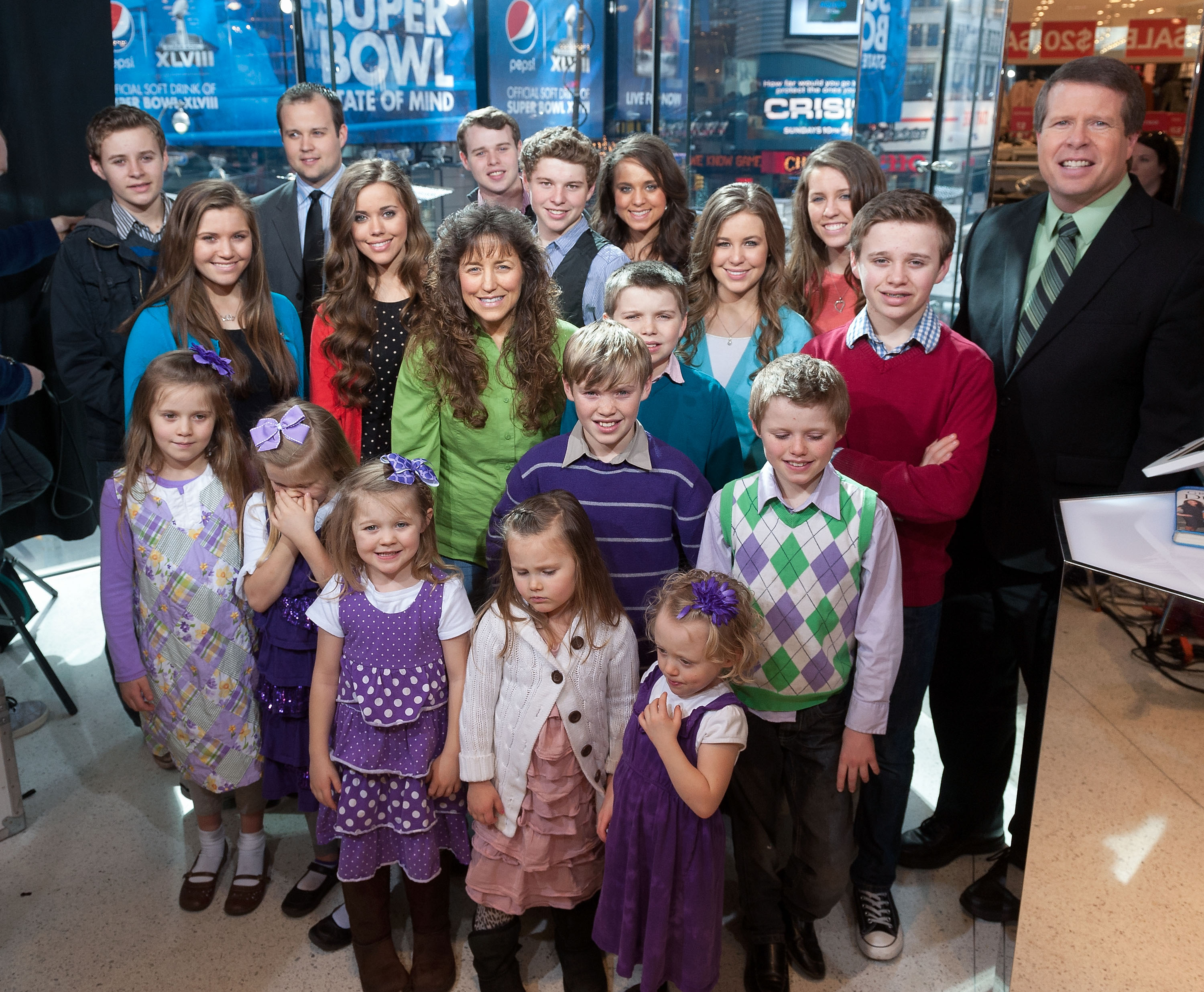 The Duggar family visits 'Extra' at their New York studios at H&M in Times Square on March 11, 2014 in New York City.