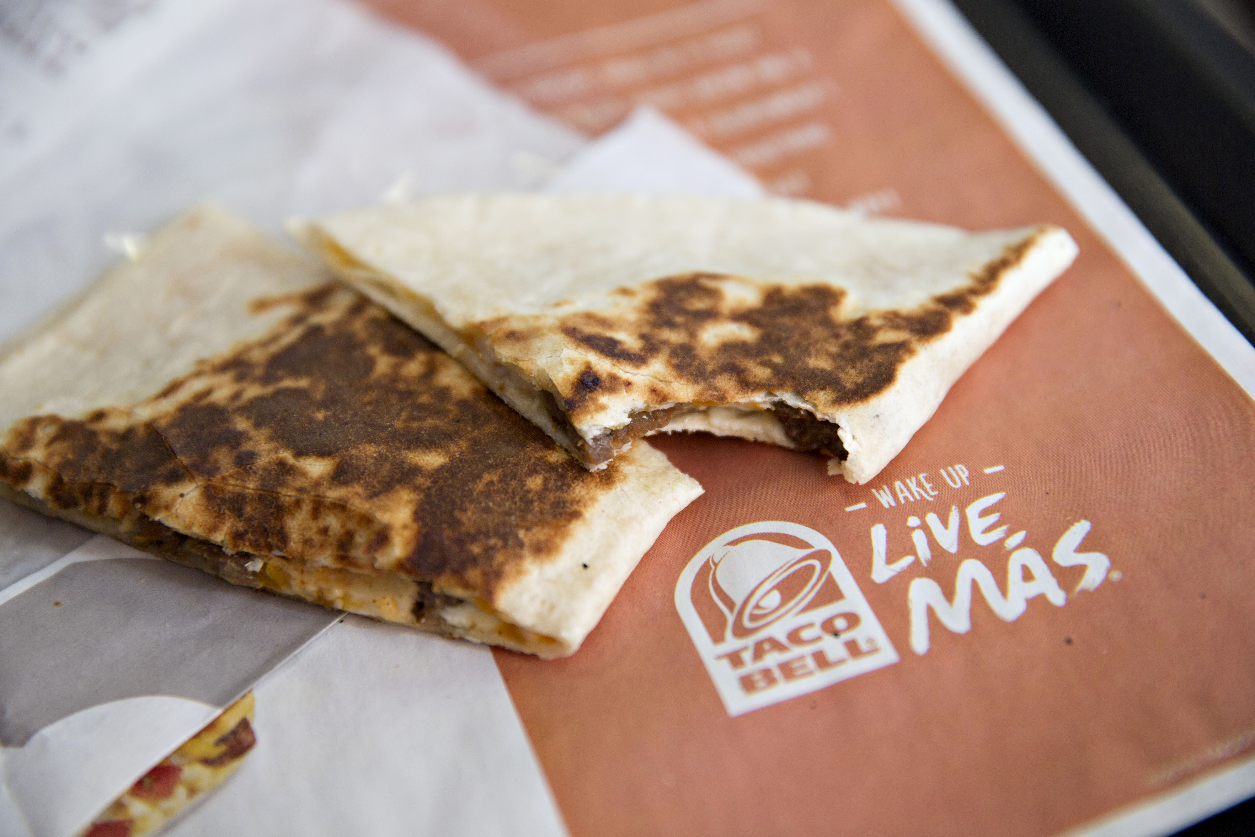 Food is arranged for a photograph at a Taco Bell restaurant in Peru, Illinois, U.S., on Thursday, Oct. 1, 2015. Yum! Brands Inc., owner of restaurant brands KFC, Pizza Hut, and Taco Bell, is scheduled to release third-quarter earnings on October 6.