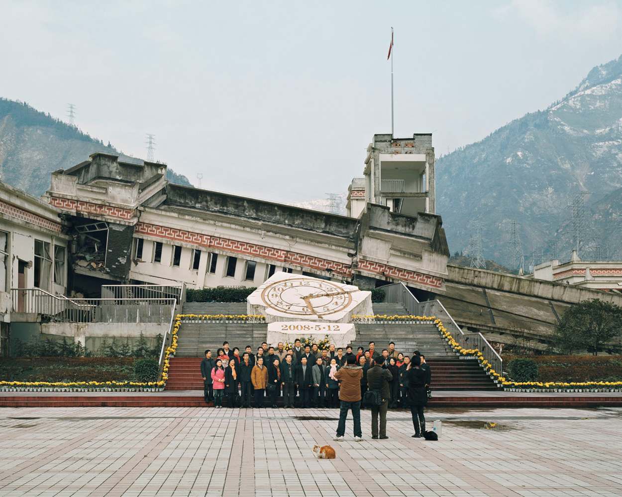 Sichuan Wenchuan earthquake ruins tour – China. 2009.<br><br>Visitors in front of Xuankou middle school, where over 53 died, and Xuankou grade school, where about 250 died.
