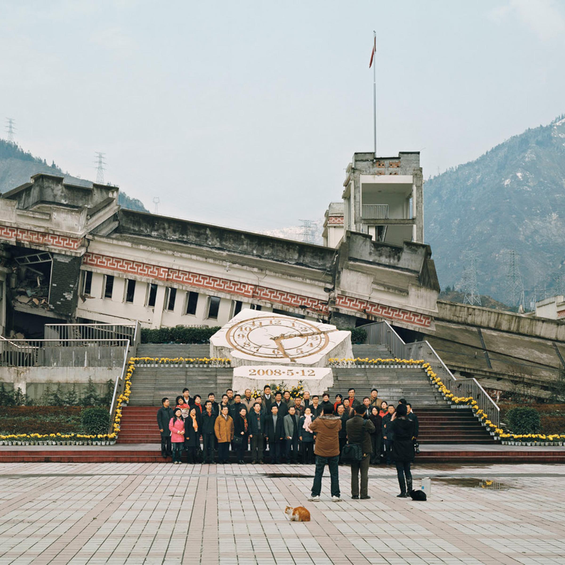 Sichuan Wenchuan earthquake ruins tour – China. 2009.<br><br>Visitors in front of Xuankou middle school, where over 53 died, and Xuankou grade school, where about 250 died.