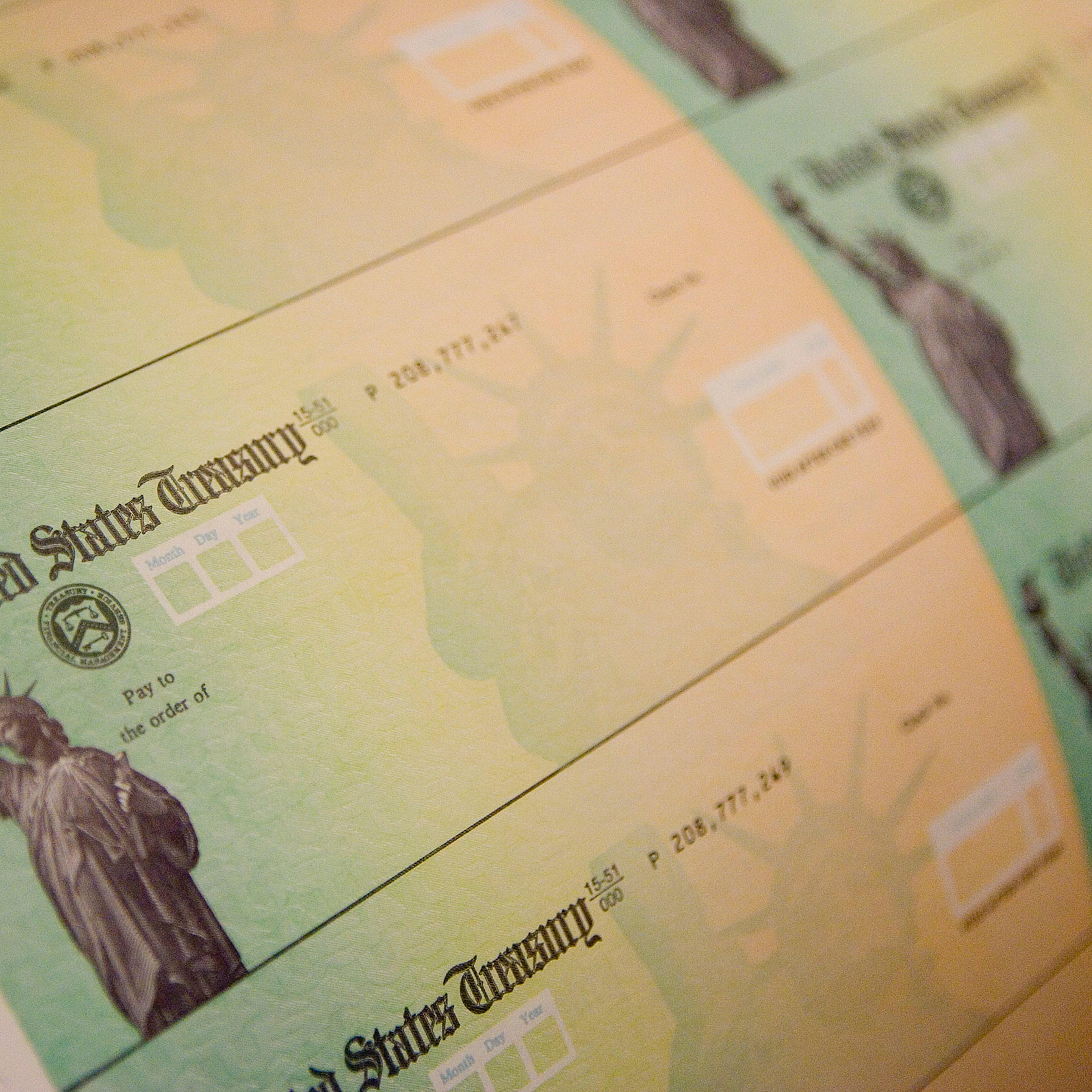 Economic stimulus checks are prepared for printing at the Philadelphia Financial Center May 8, 2008 in Philadelphia.