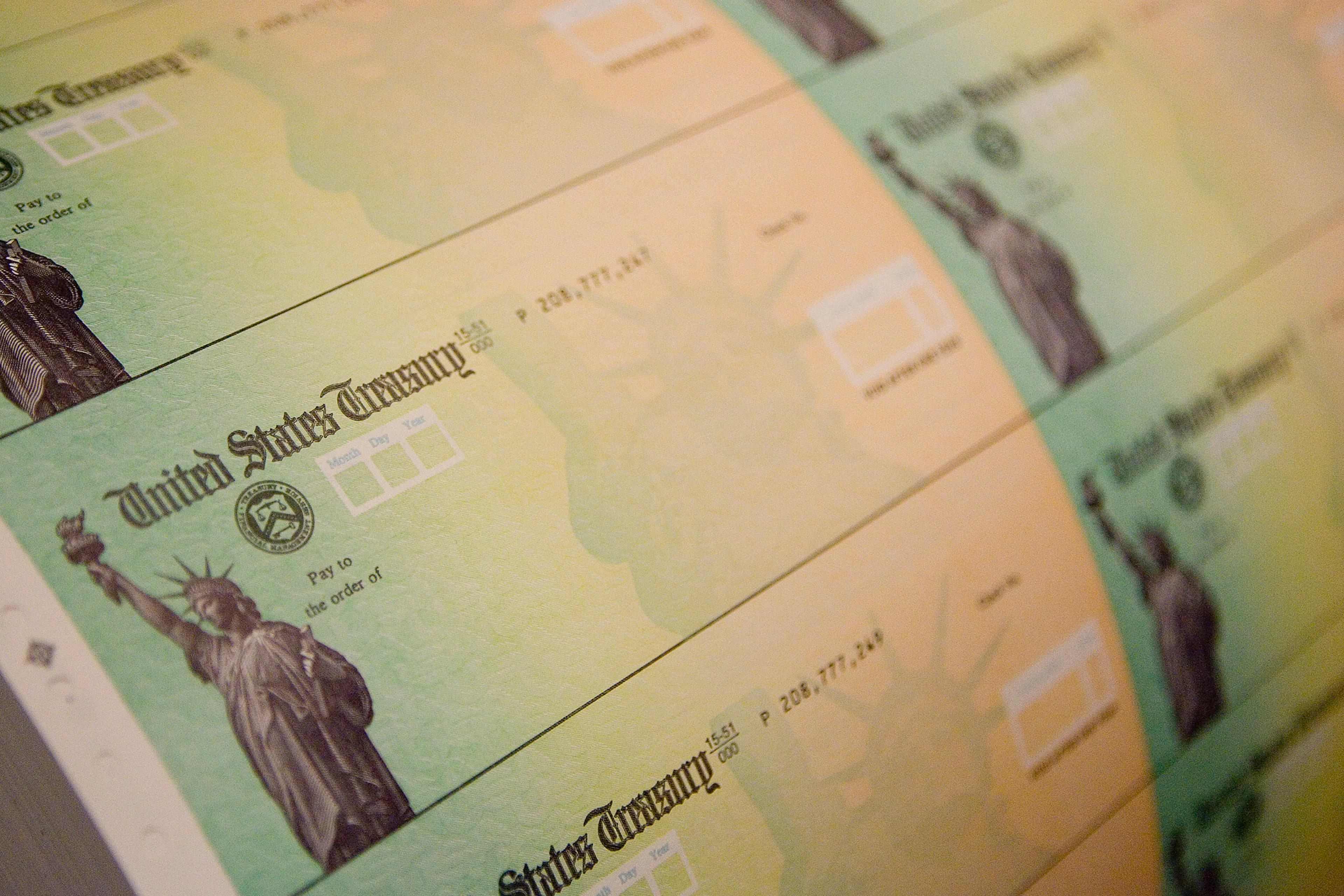 Economic stimulus checks are prepared for printing at the Philadelphia Financial Center May 8, 2008 in Philadelphia.