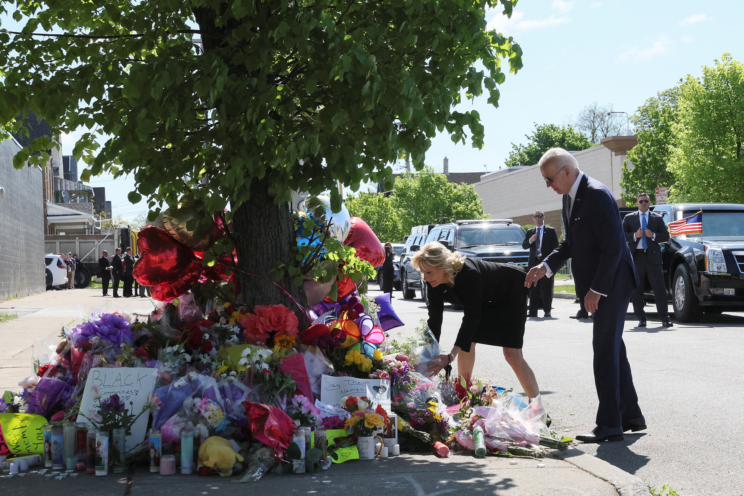 U.S. President Joe Biden and first lady Jill Biden pay their respects to the 10 people killed in a mass shooting by a gunman authorities say was motivated by racism, at the Tops Friendly Markets memorial site in Buffalo, N.Y. on May 17.