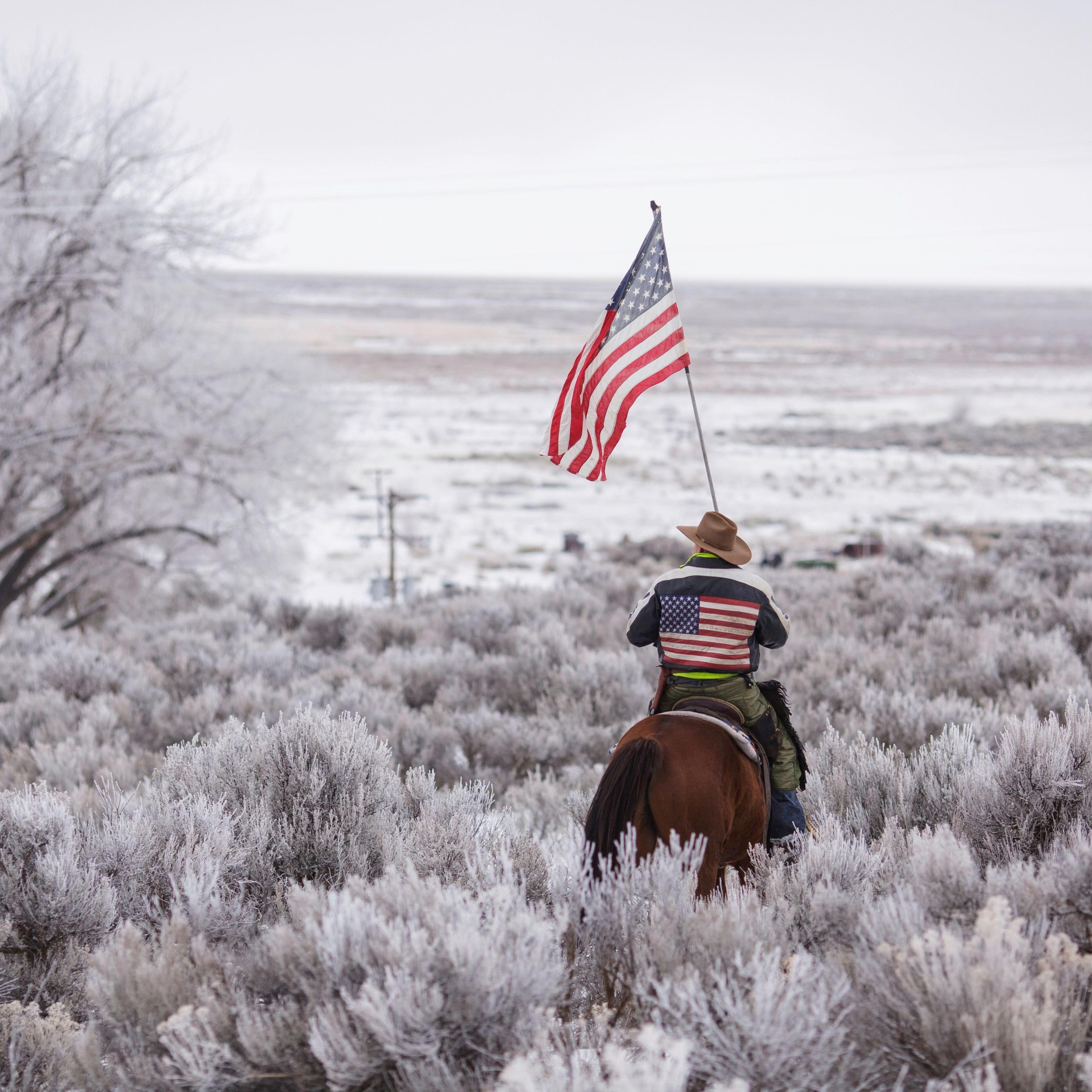 A man rides a horse at the occupied Malheur National Wildlife Refuge, on the sixth day of the occupation of the federal building, in Burns, Oregon, Jan. 7, 2016.