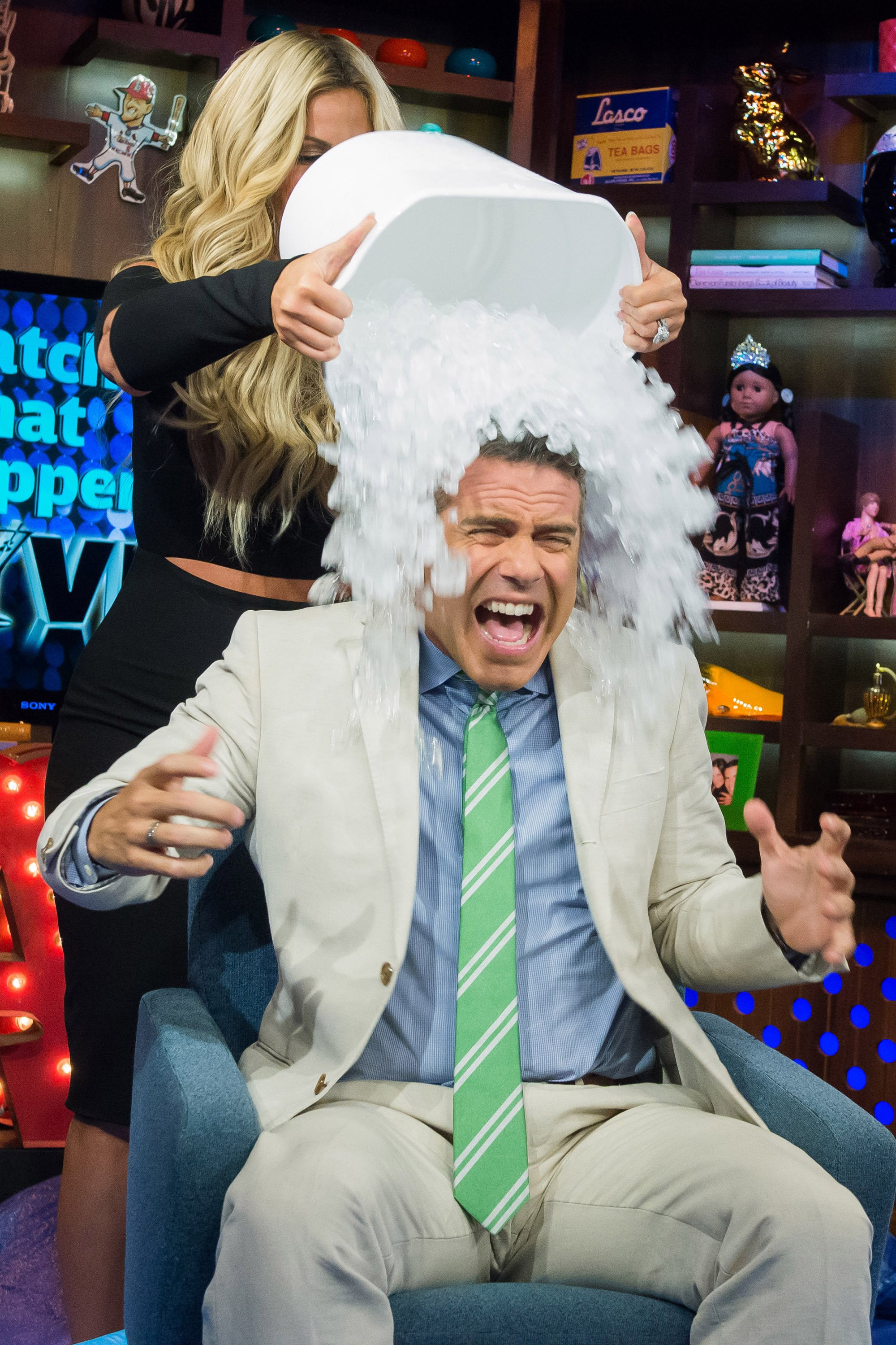 Andy Cohen and Kim Zolciak partake in the ALS Ice Bucket challenge on "Watch What Happens Live" on Bravo.