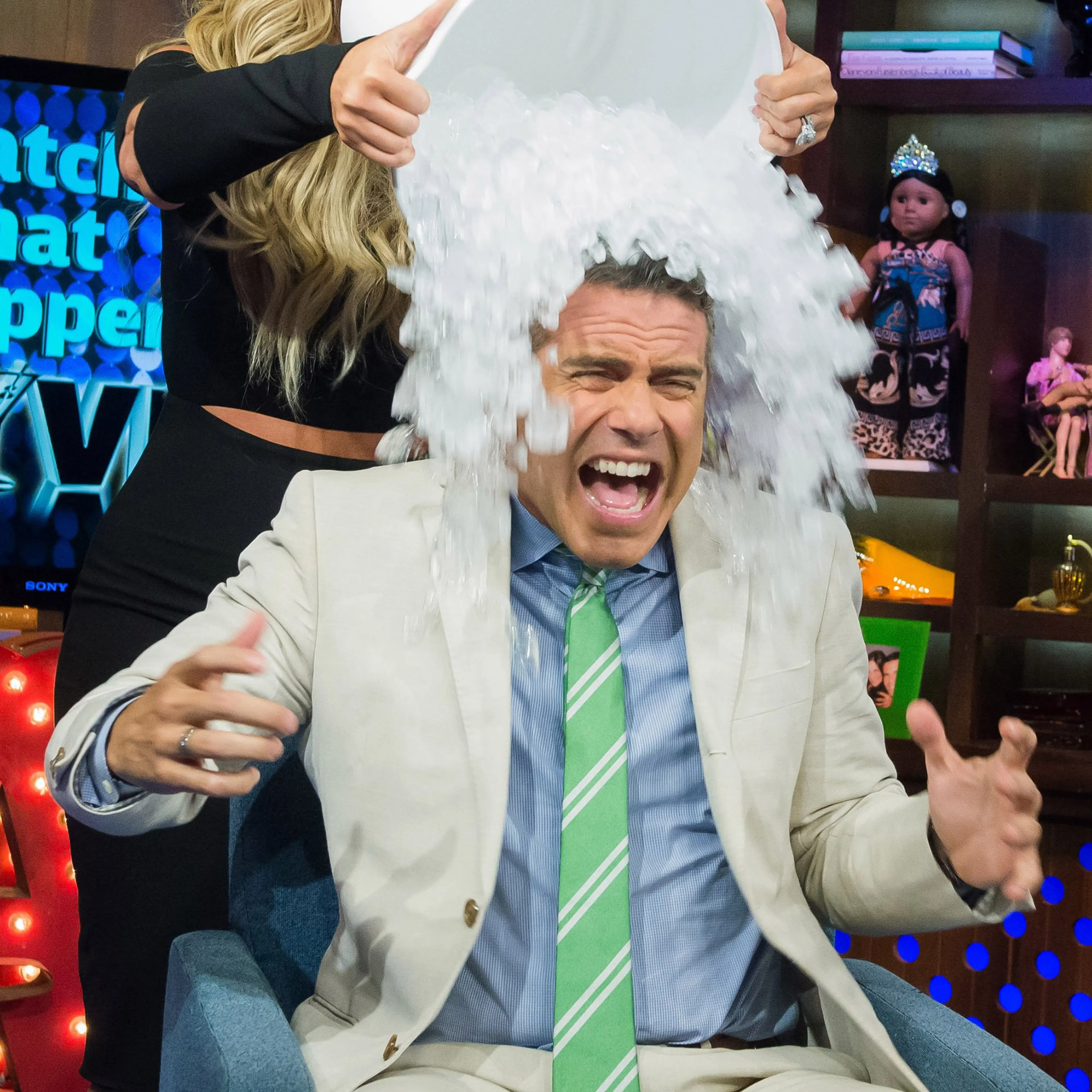 Andy Cohen and Kim Zolciak partake in the ALS Ice Bucket challenge on "Watch What Happens Live" on Bravo.