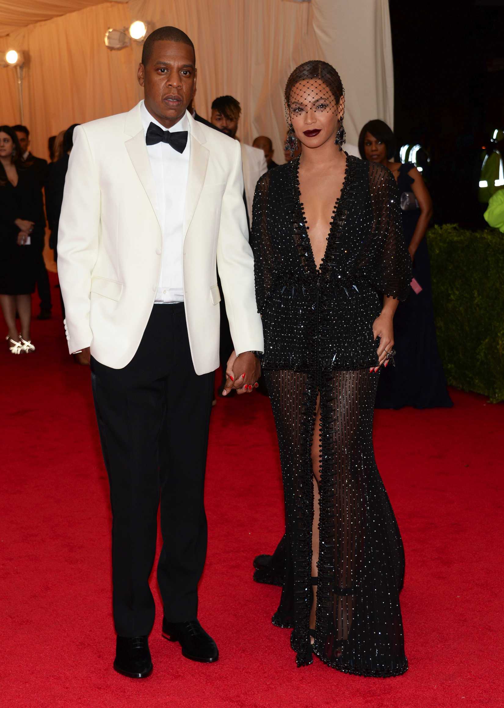 This May 5, 2014 file photo shows Jay Z, left, and Beyonce at The Metropolitan Museum of Art's Costume Institute benefit gala celebrating "Charles James: Beyond Fashion" in New York, on the night when Beyonce's sister allegedly attacked Jay Z.