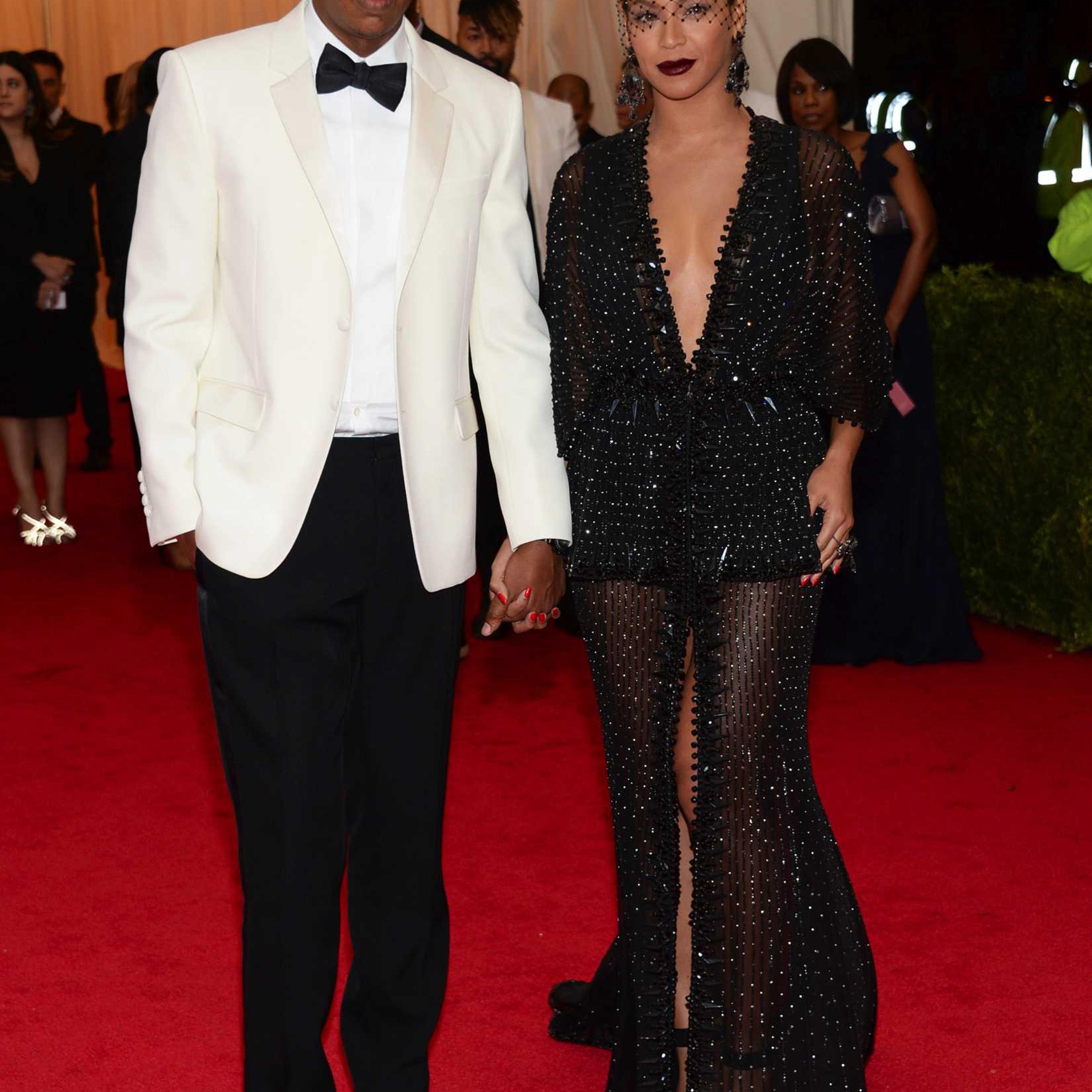 This May 5, 2014 file photo shows Jay Z, left, and Beyonce at The Metropolitan Museum of Art's Costume Institute benefit gala celebrating "Charles James: Beyond Fashion" in New York, on the night when Beyonce's sister allegedly attacked Jay Z.