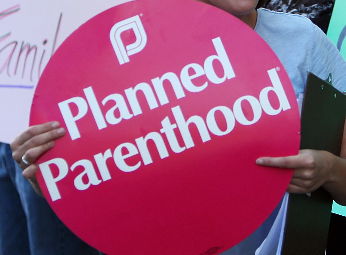 Planned Parenthood patients, volunteers and supporters rally outside the office of Assembly Speaker-elect John Perez to oppose cuts to family planning funds by California Gov. Arnold Schwarzenegger on Jan. 12, 2010 in Los Angeles.