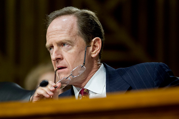 Senator Patrick "Pat" Toomey, a Republican from Pennsylvania, listens during a Senate Banking Committee hearing with Janet Yellen, chair of the U.S. Federal Reserve, not pictured, in Washington, D.C., U.S., on Tuesday, Feb. 24, 2015.