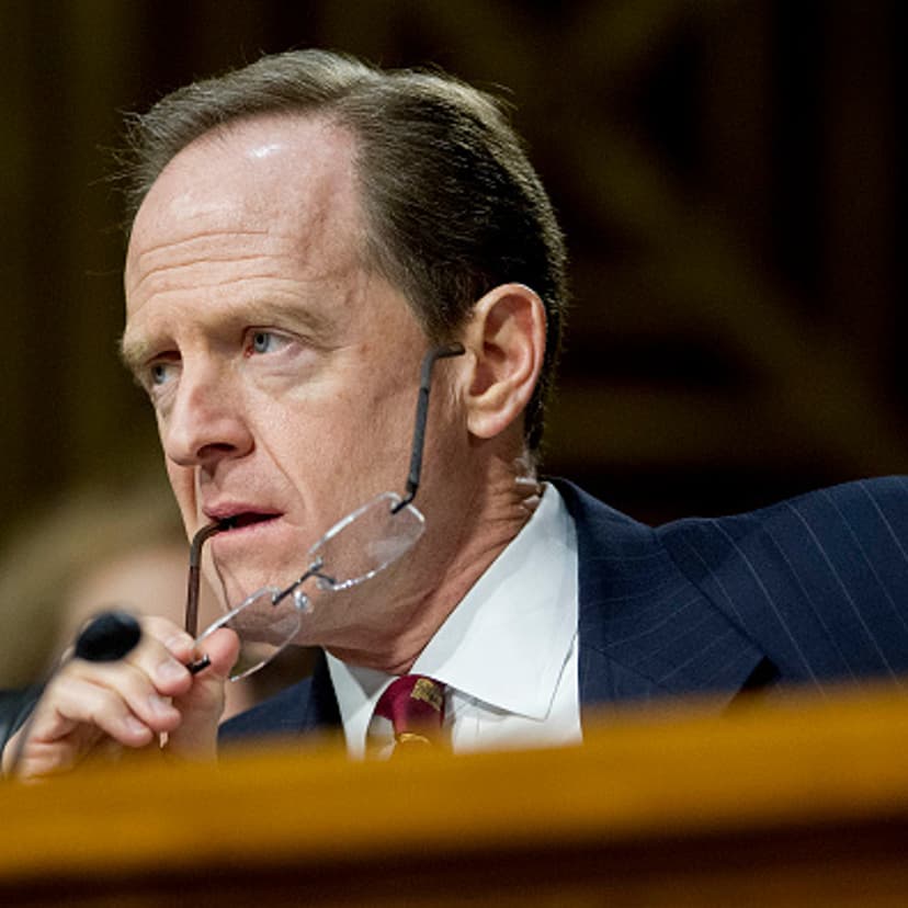 Senator Patrick "Pat" Toomey, a Republican from Pennsylvania, listens during a Senate Banking Committee hearing with Janet Yellen, chair of the U.S. Federal Reserve, not pictured, in Washington, D.C., U.S., on Tuesday, Feb. 24, 2015.