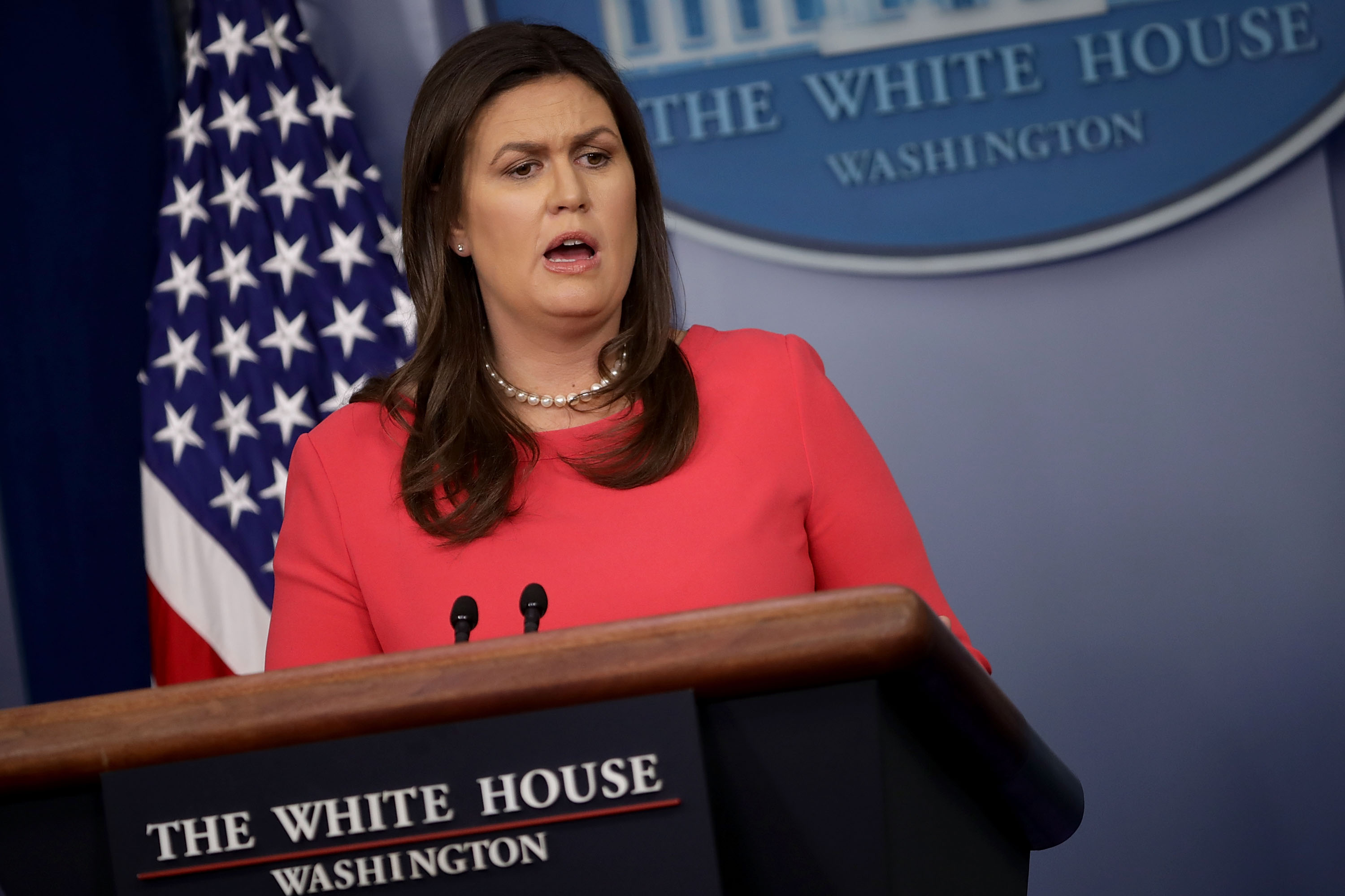 Sarah Sanders speaks to reporters in a news conference
