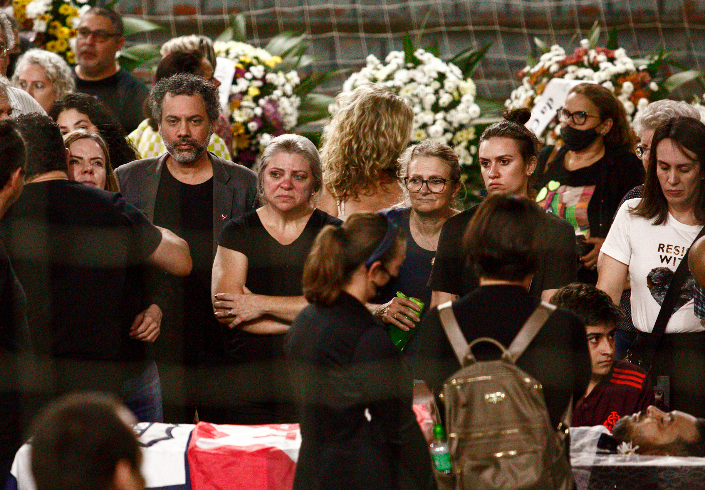 People attend the funeral of Marcelo Arruda held inside the Sebastiao Flores gymnasium in Foz do Iguacu, Brazil, July 10. An advocate of former Brazilian President Luiz Inacio Lula da Silva who is running for election, Arruda was shot dead at his birthday party. 