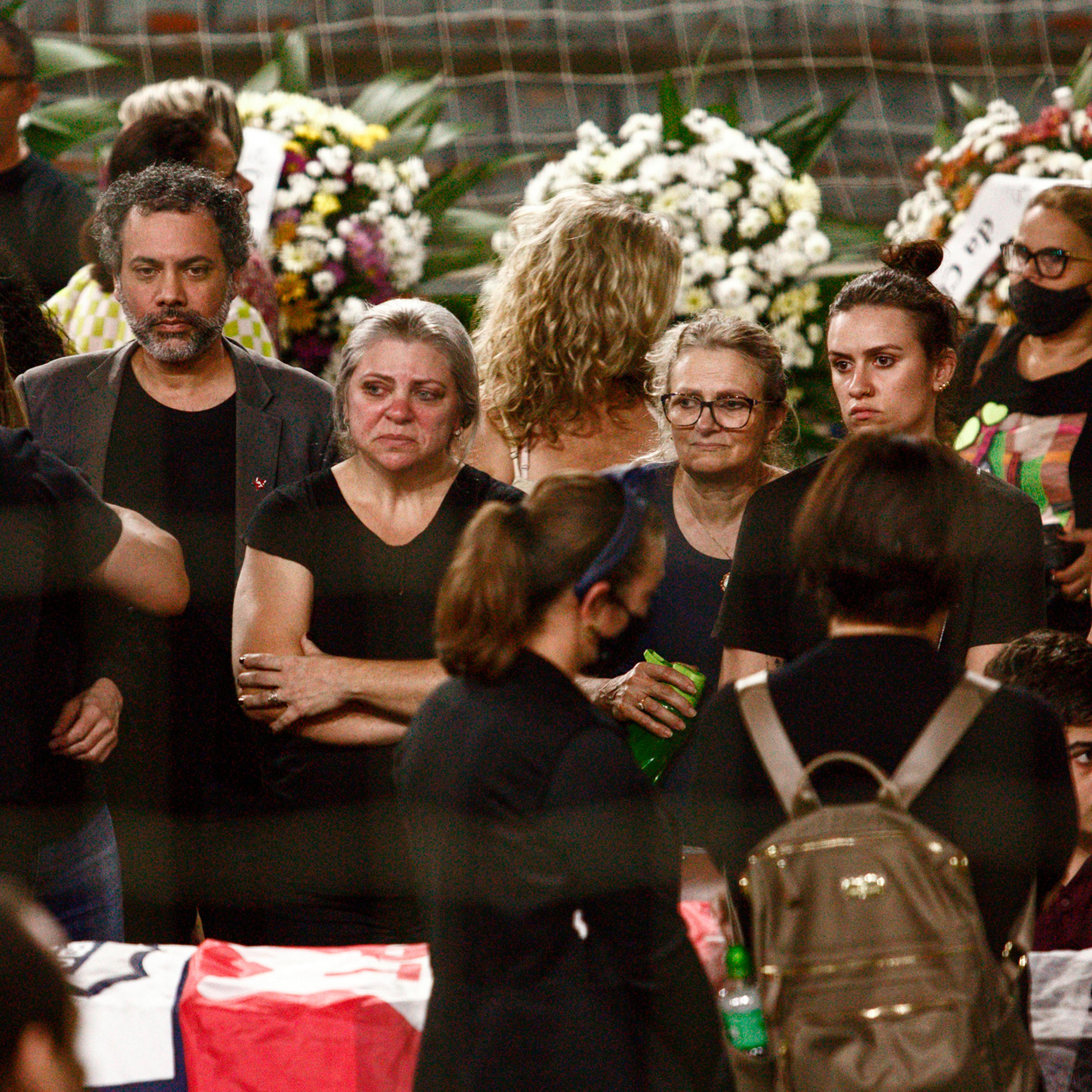 People attend the funeral of Marcelo Arruda held inside the Sebastiao Flores gymnasium in Foz do Iguacu, Brazil, July 10. An advocate of former Brazilian President Luiz Inacio Lula da Silva who is running for election, Arruda was shot dead at his birthday party.